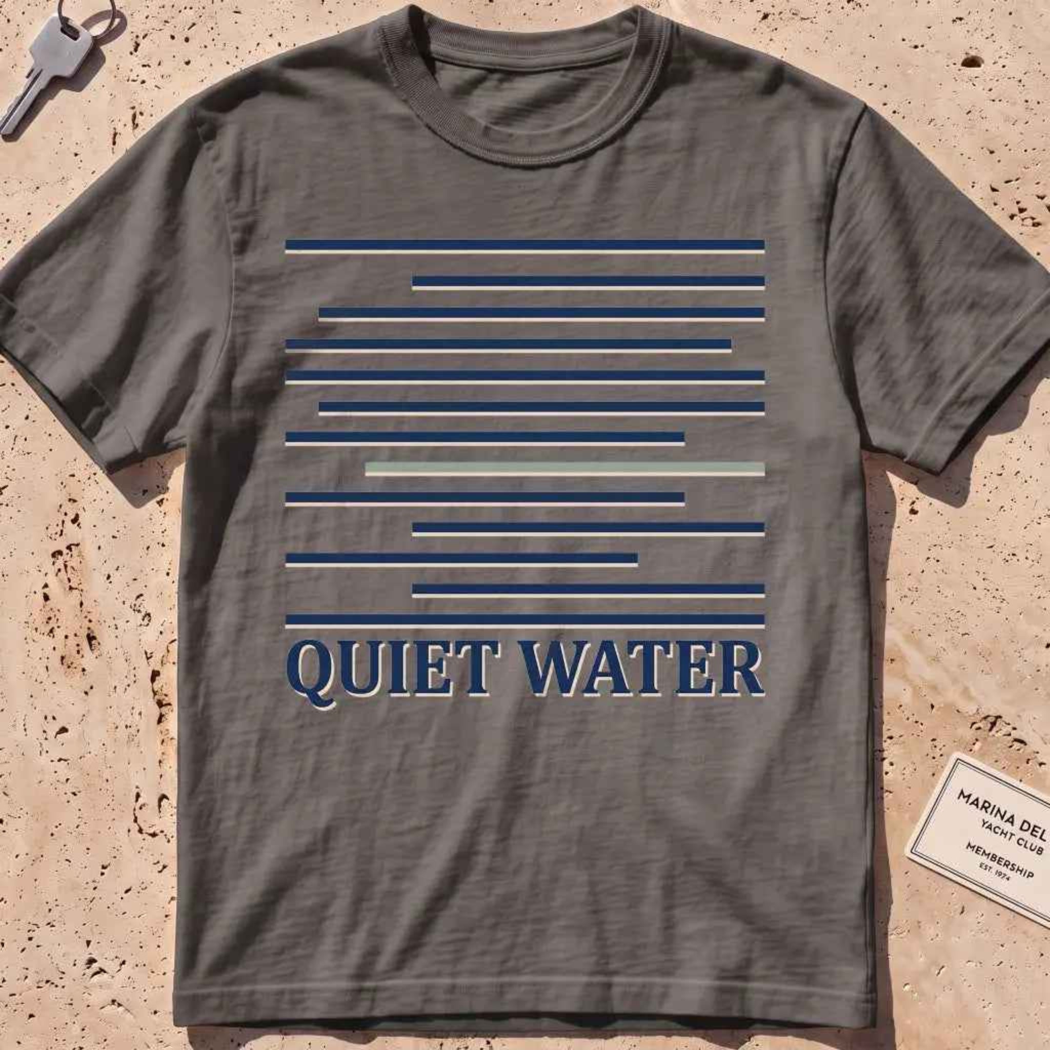 pepper heavyweight tee with still-water lines and "Quiet Water" type.