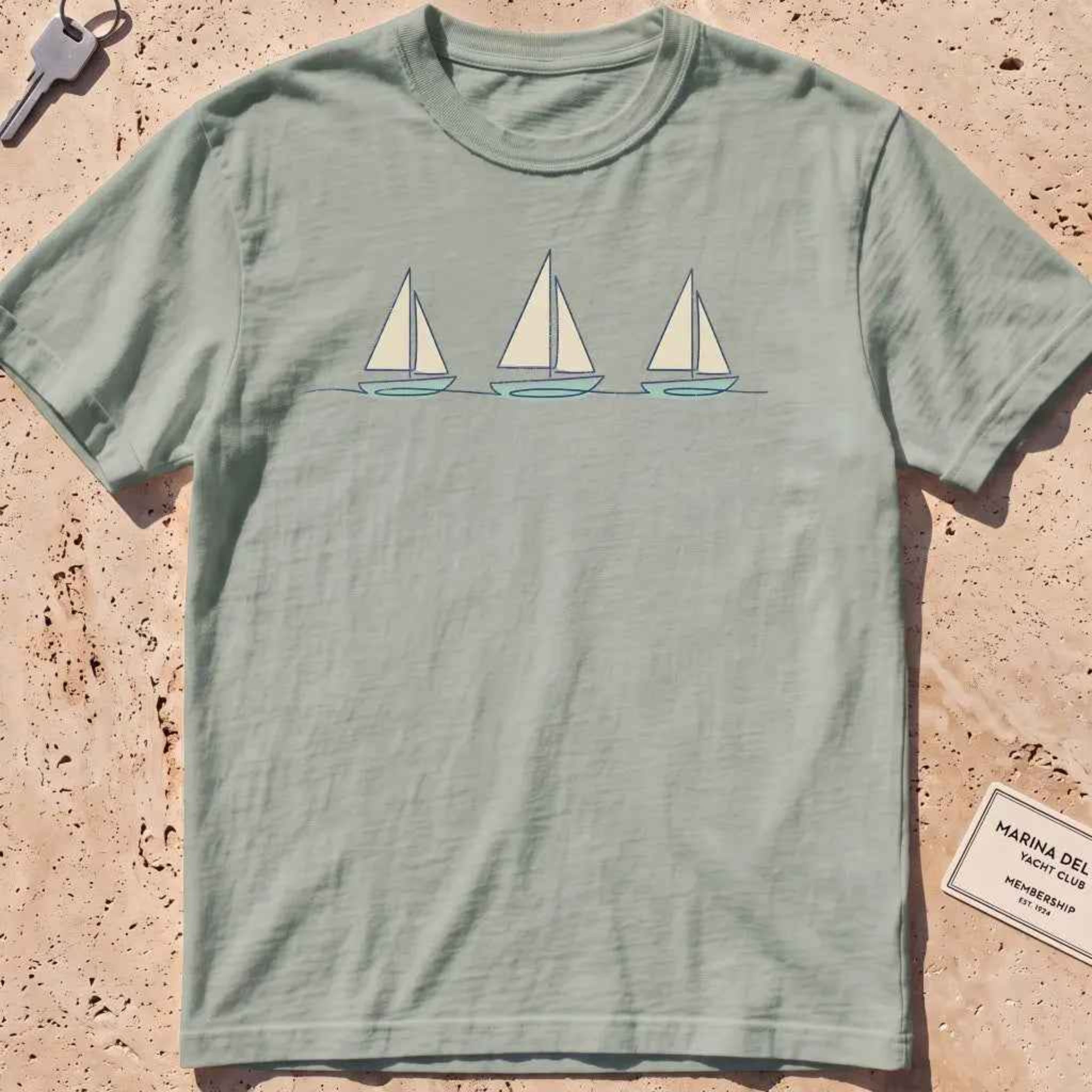 bay heavyweight tee with three sailboats on a low horizon graphic.