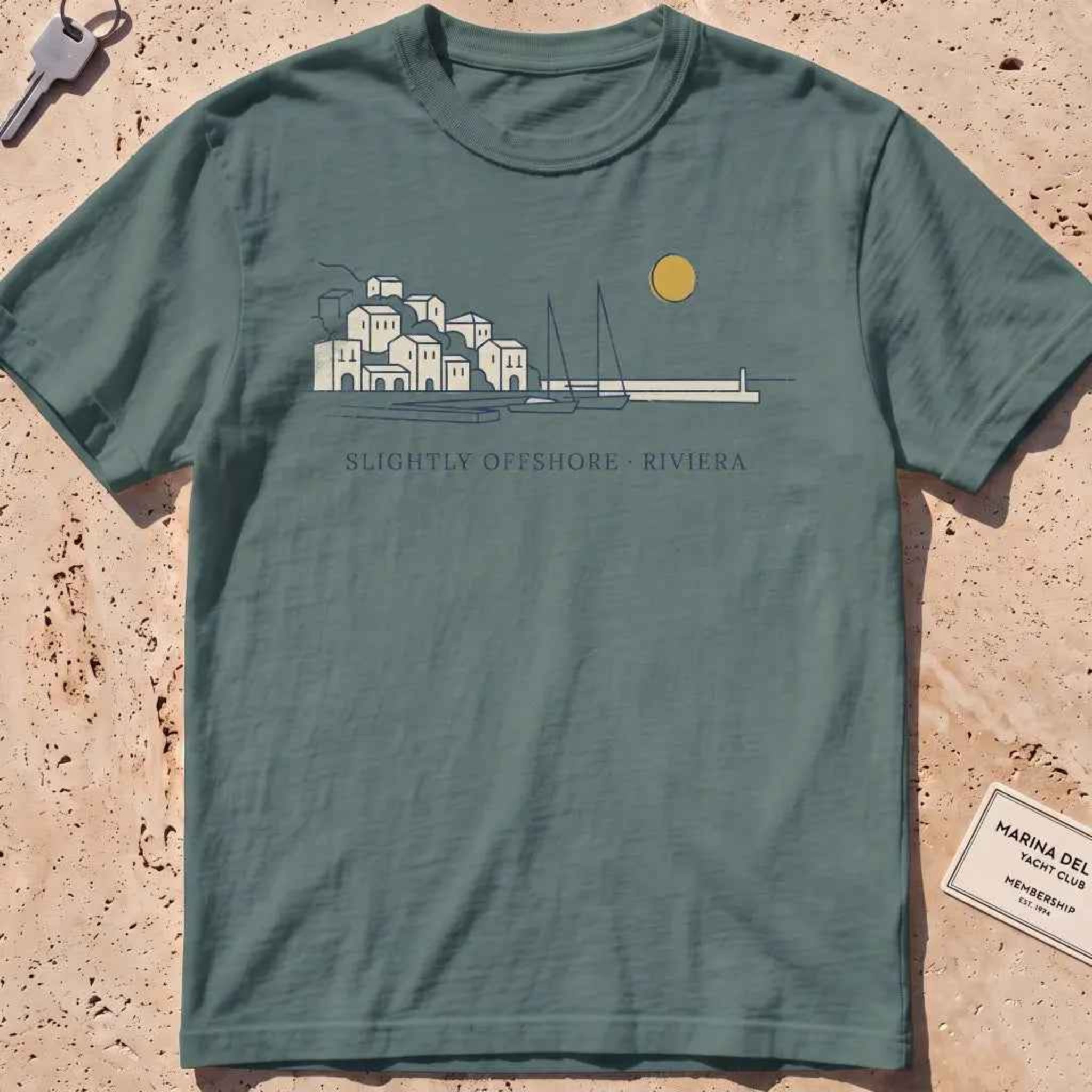 blue spruce heavyweight tee with a single-line harbor skyline and mustard sun.