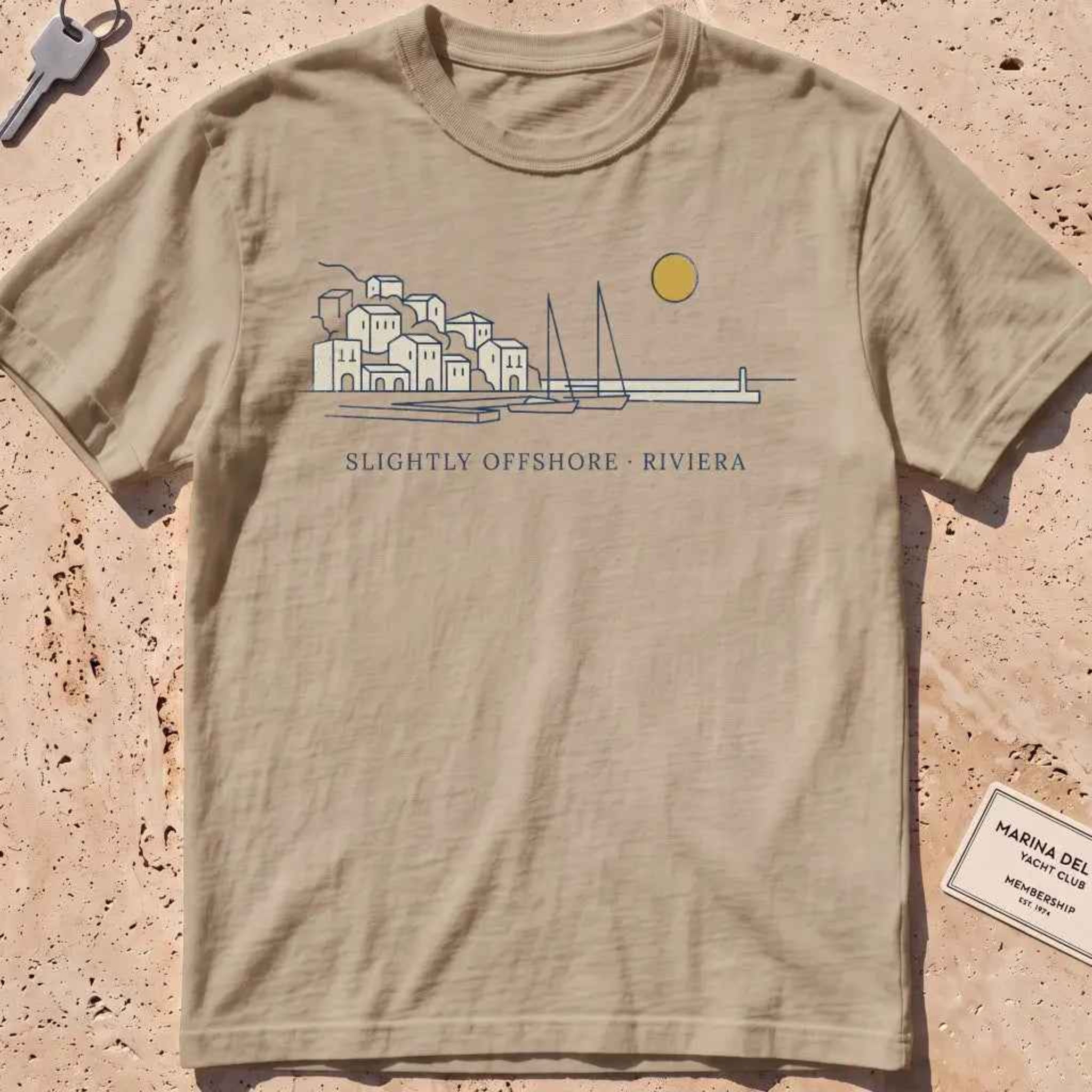khaki heavyweight tee with a single-line harbor skyline and mustard sun.