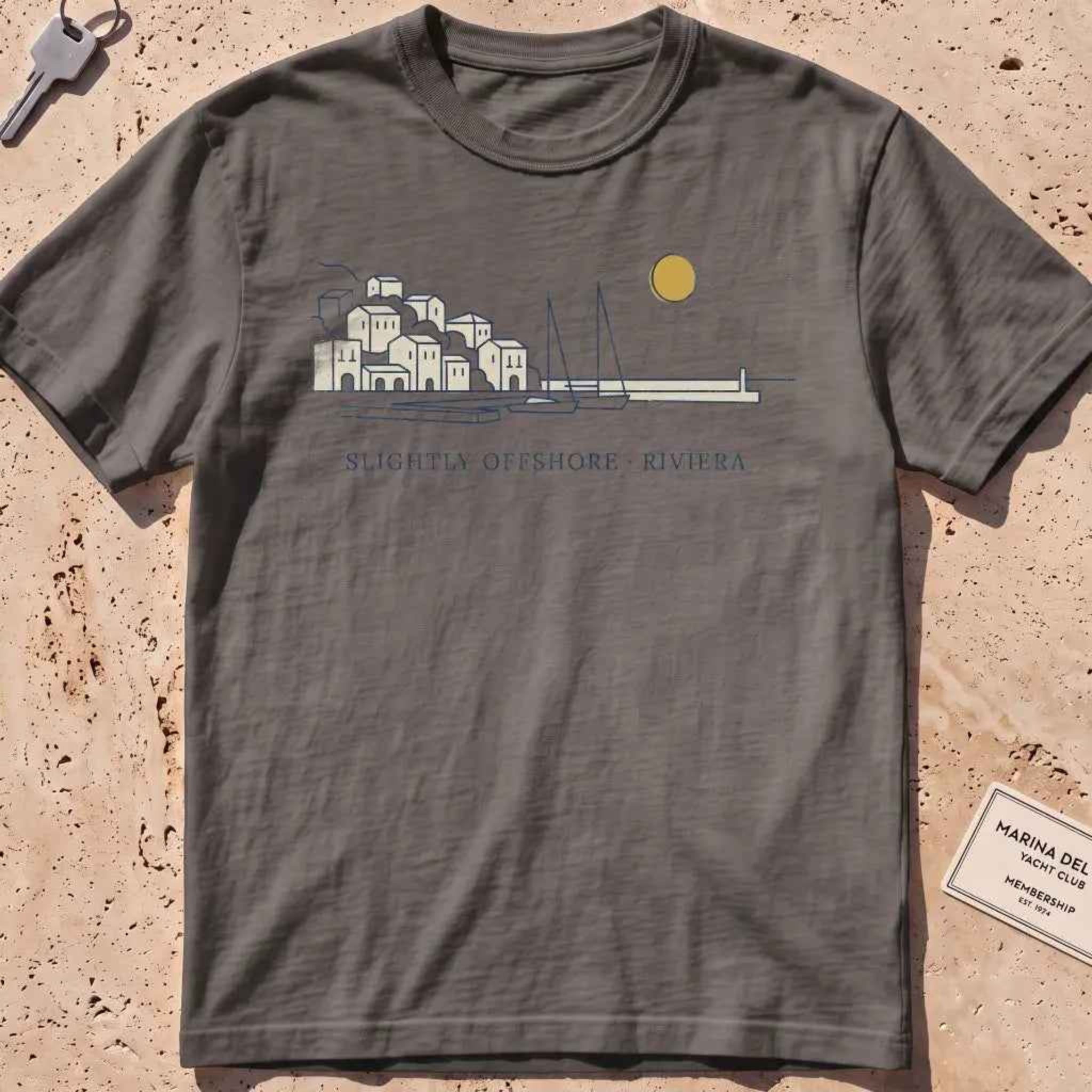pepper heavyweight tee with a single-line harbor skyline and mustard sun.