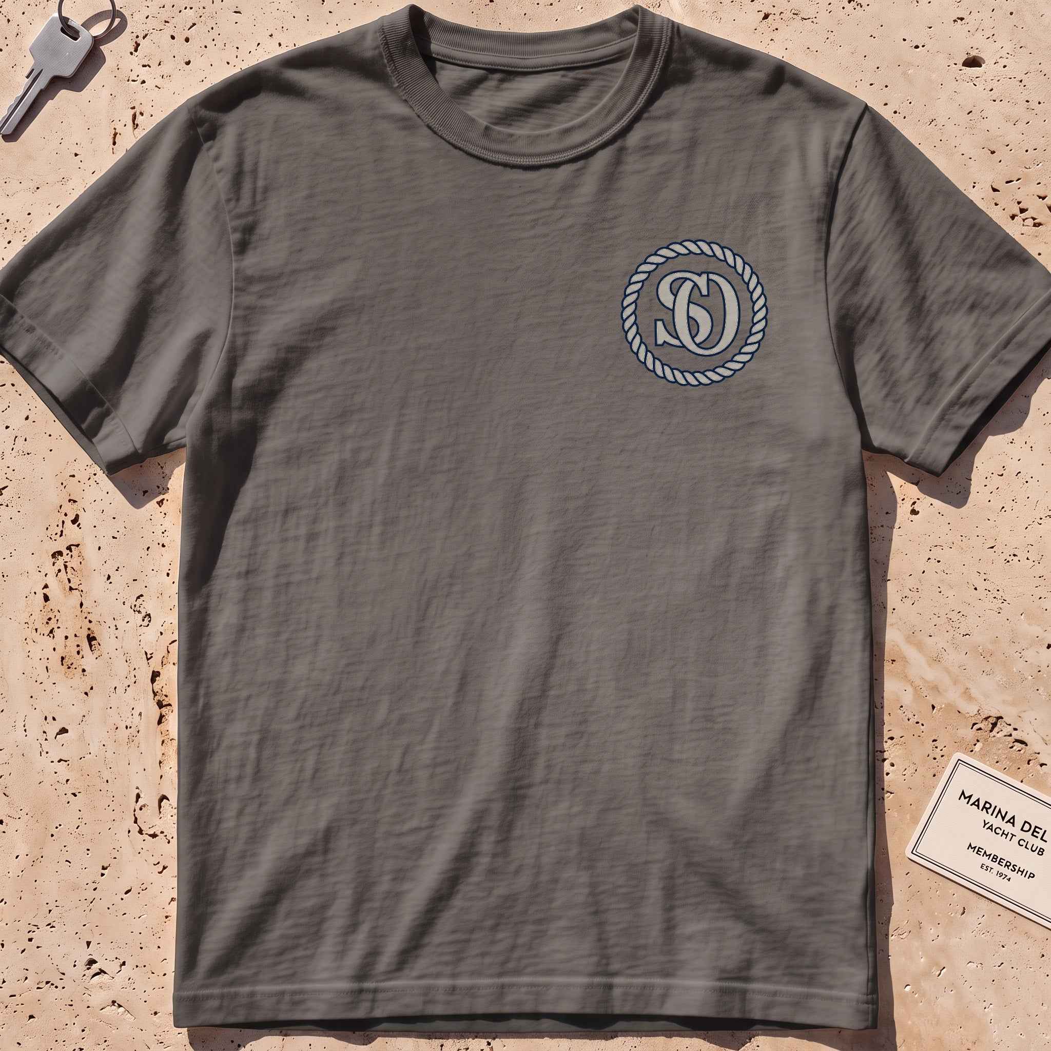 pepper heavyweight tee with a rope-ring SO monogram crest graphic.