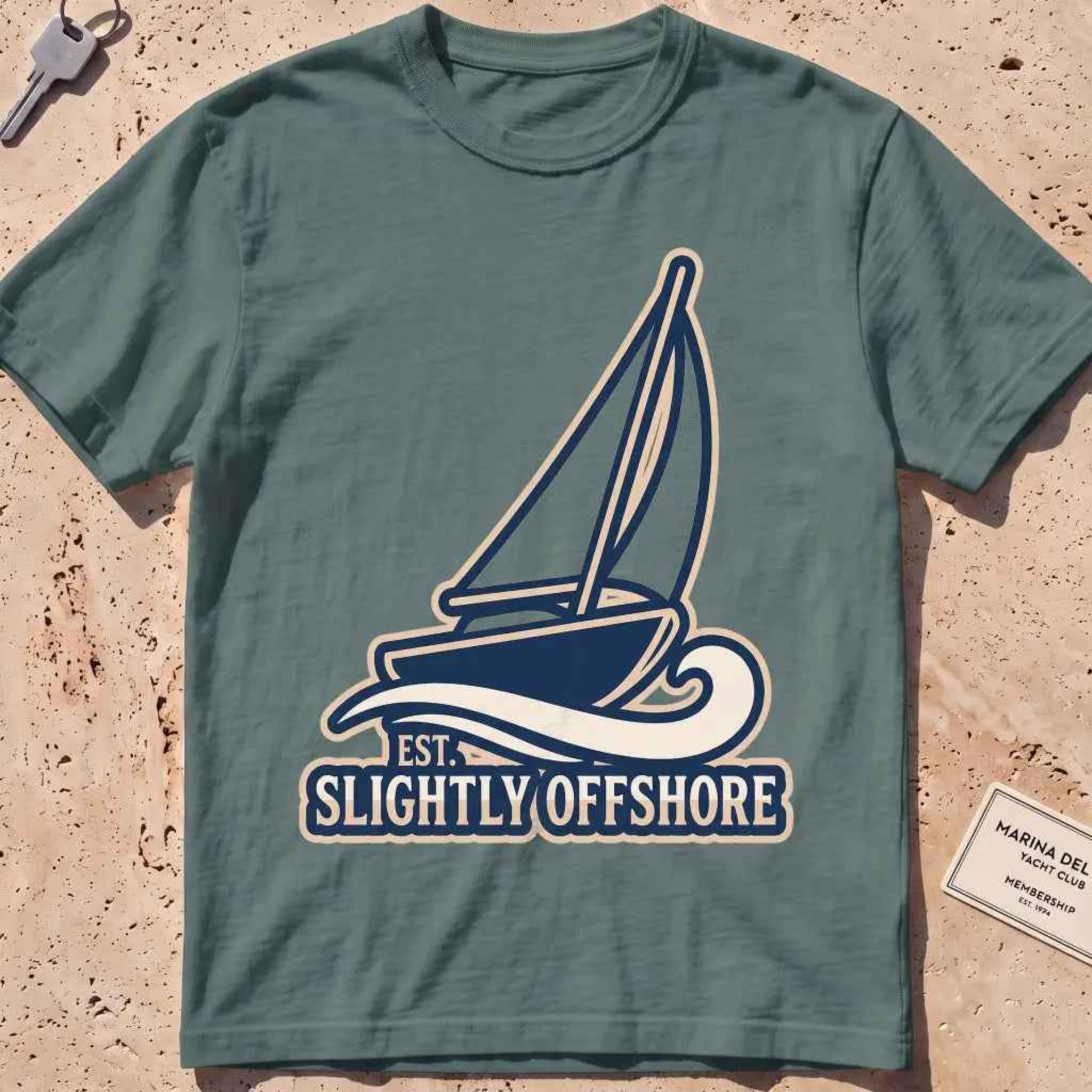 blue spruce heavyweight tee with a sailboat heeling into the wind, "Sail Away" graphic.