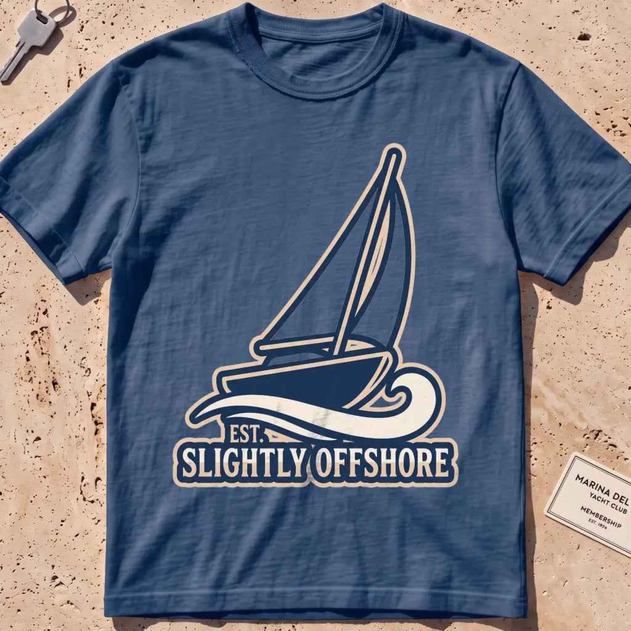 midnight heavyweight tee with a sailboat heeling into the wind, "Sail Away" graphic.