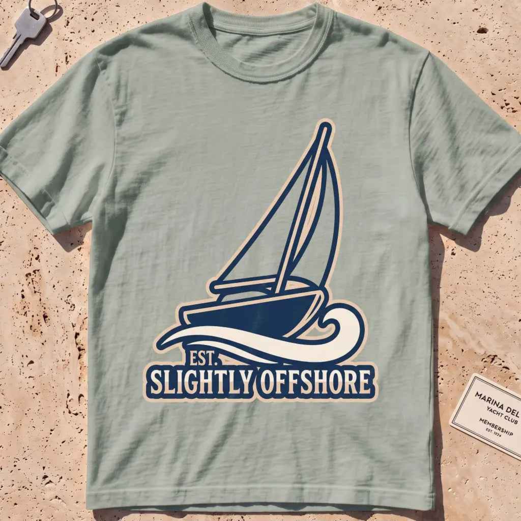 bay heavyweight tee with a sailboat heeling into the wind, "Sail Away" graphic.