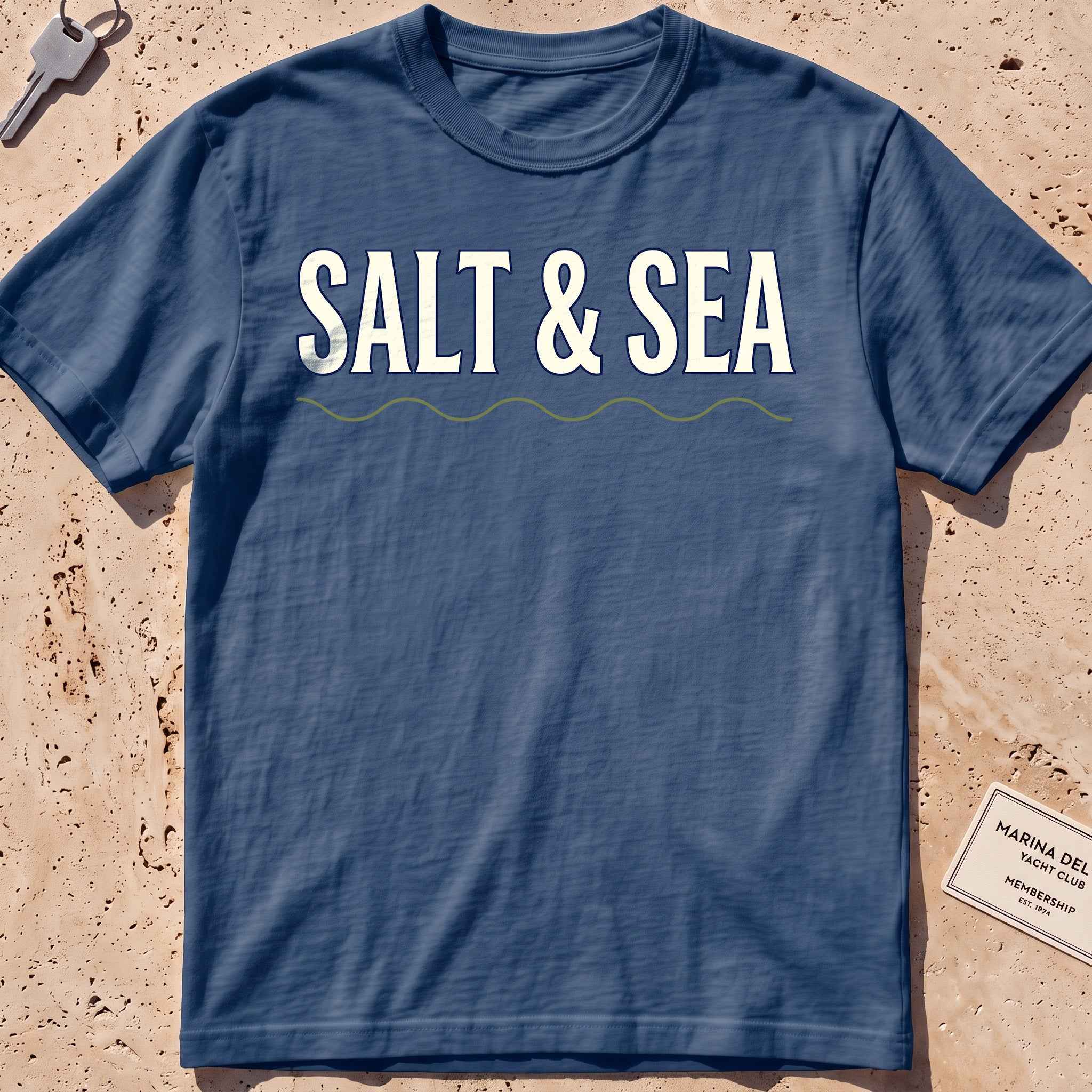 midnight heavyweight tee with bold "Salt & Sea" type graphic.