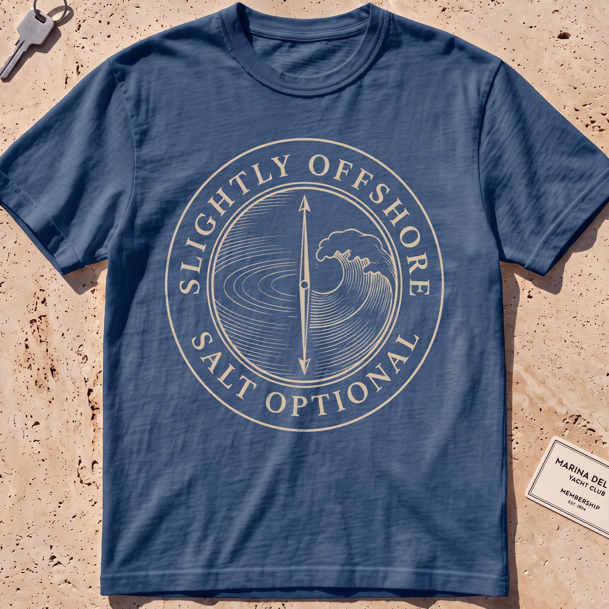 midnight heavyweight tee with a split lake-and-wave "Salt Optional" crest.