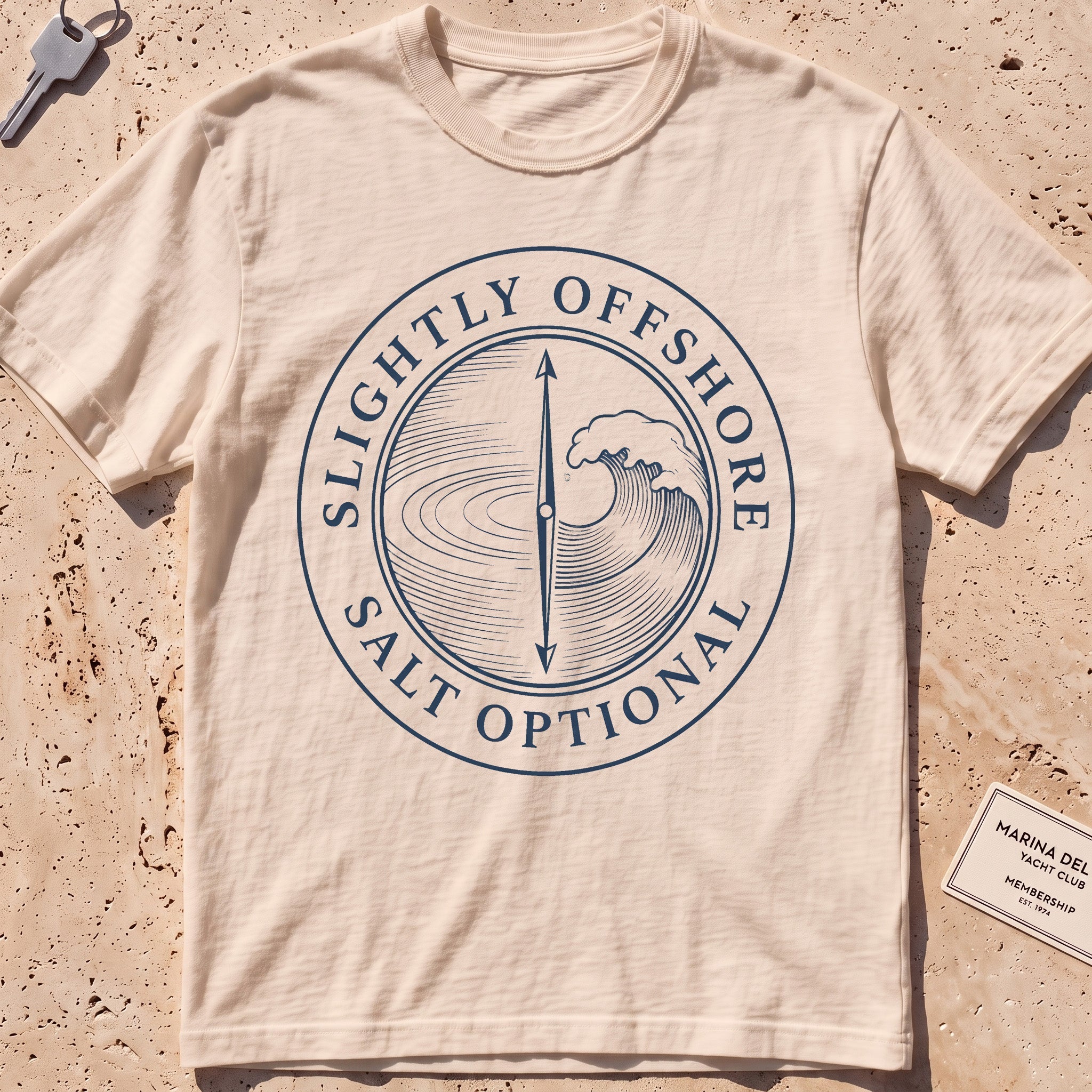 ivory heavyweight tee with a split lake-and-wave "Salt Optional" crest.