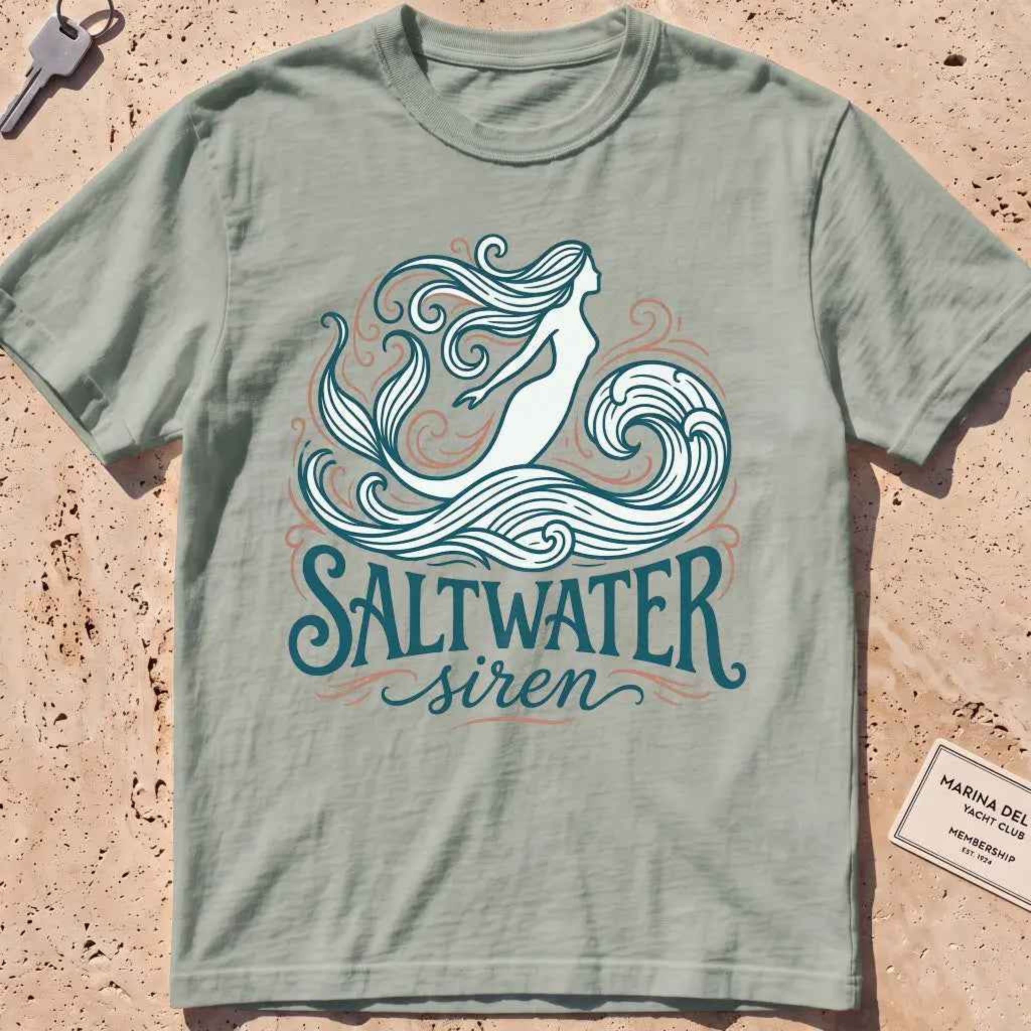 bay heavyweight tee with a mermaid line-art "Saltwater Siren" graphic.