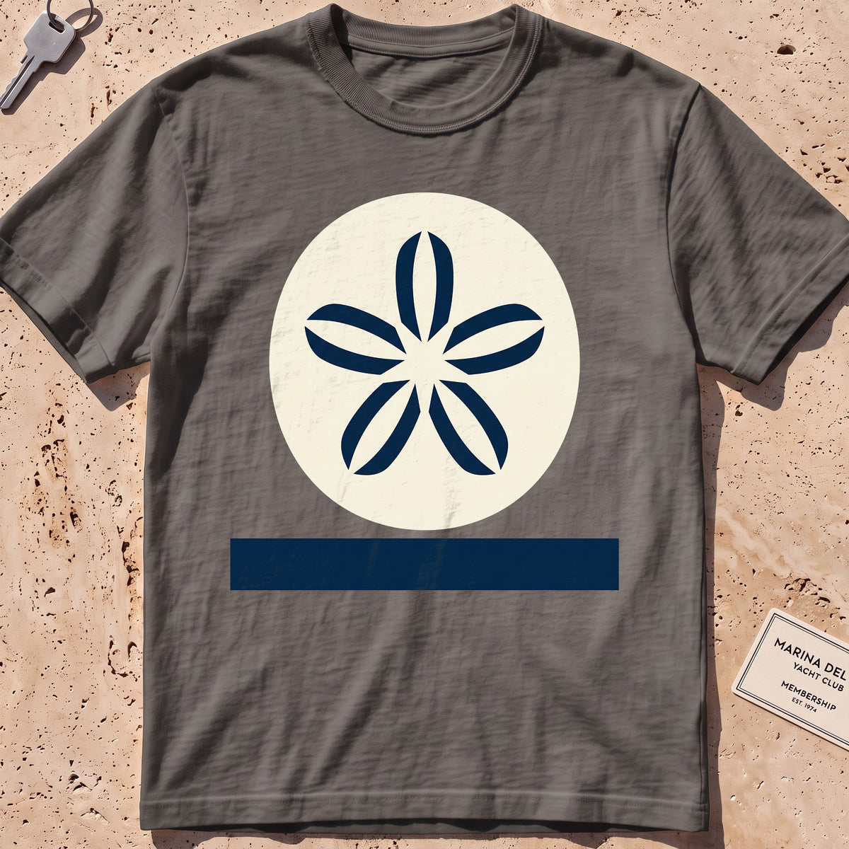 pepper heavyweight tee with a flat-geometric sand dollar graphic.