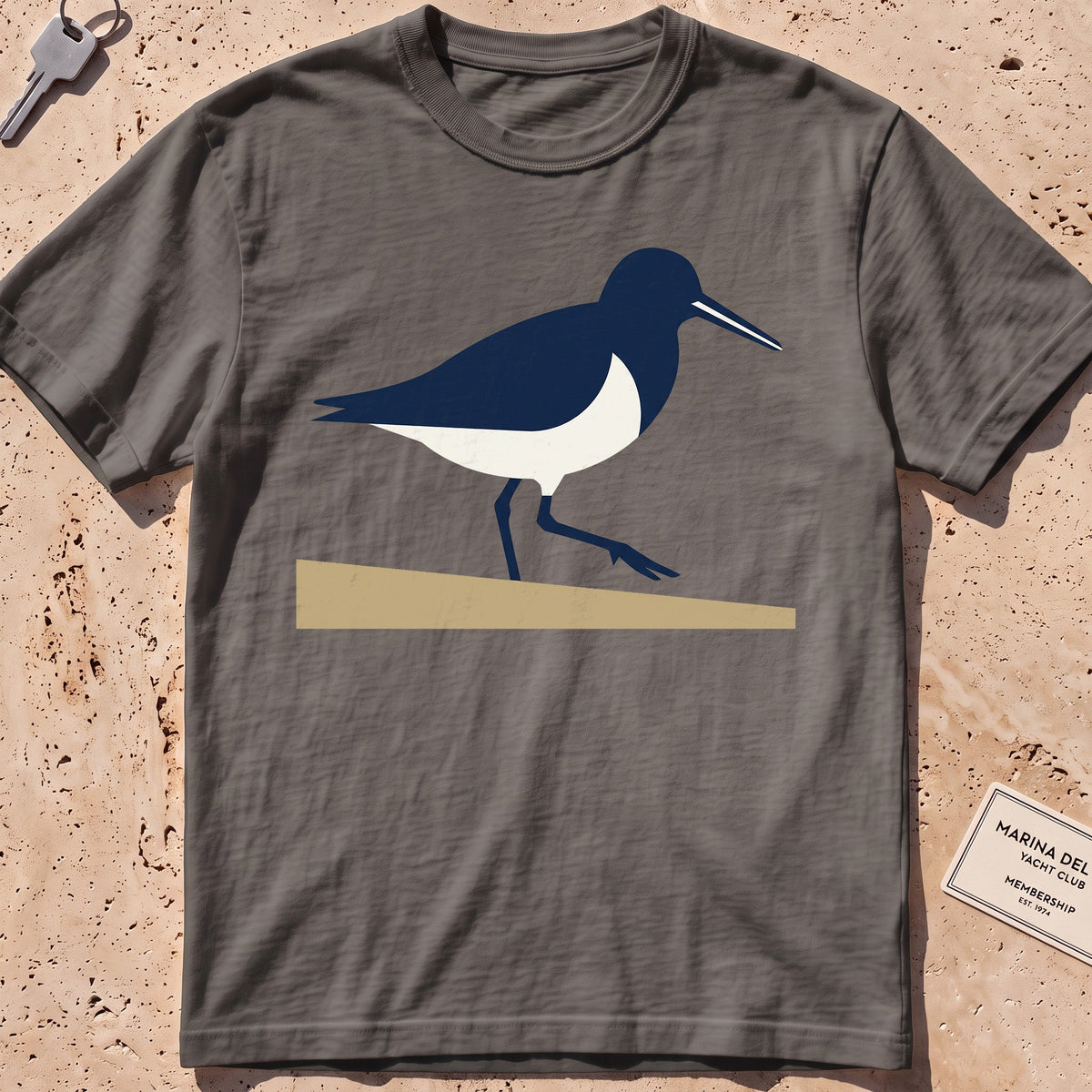 pepper heavyweight tee with a flat-geometric sandpiper graphic.