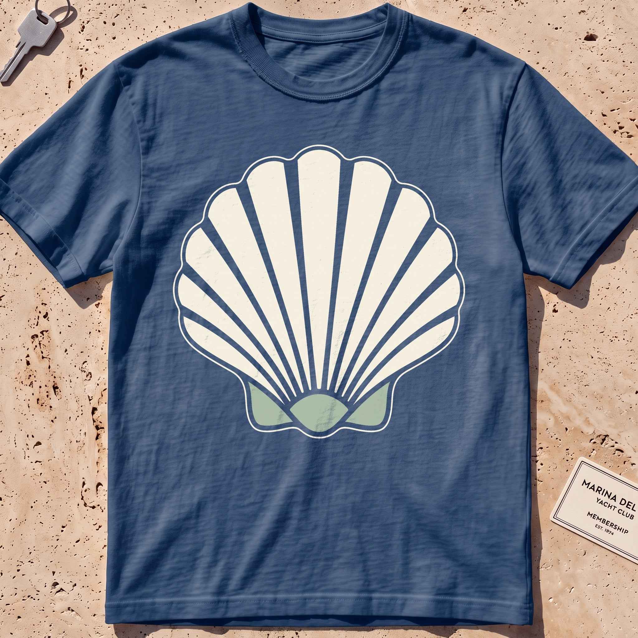midnight heavyweight tee with a bold scallop shell graphic.
