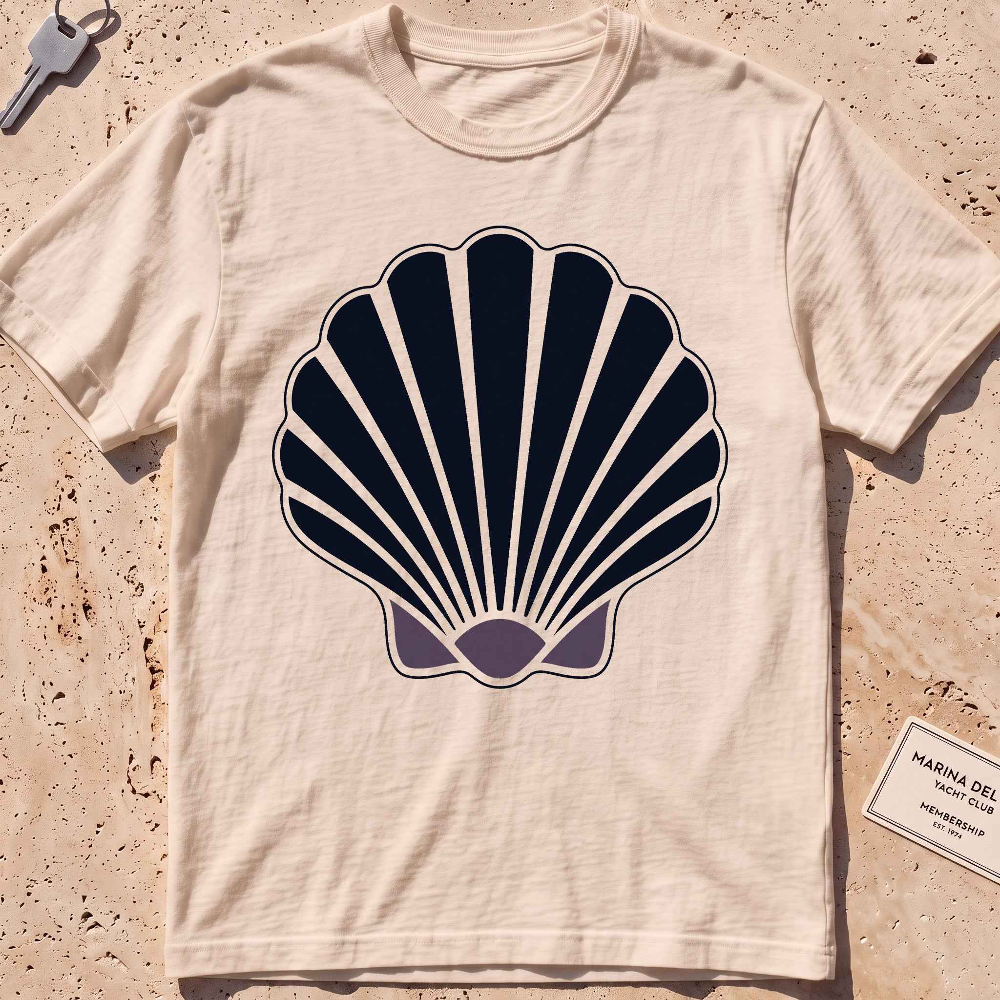 ivory heavyweight tee with a bold scallop shell graphic.