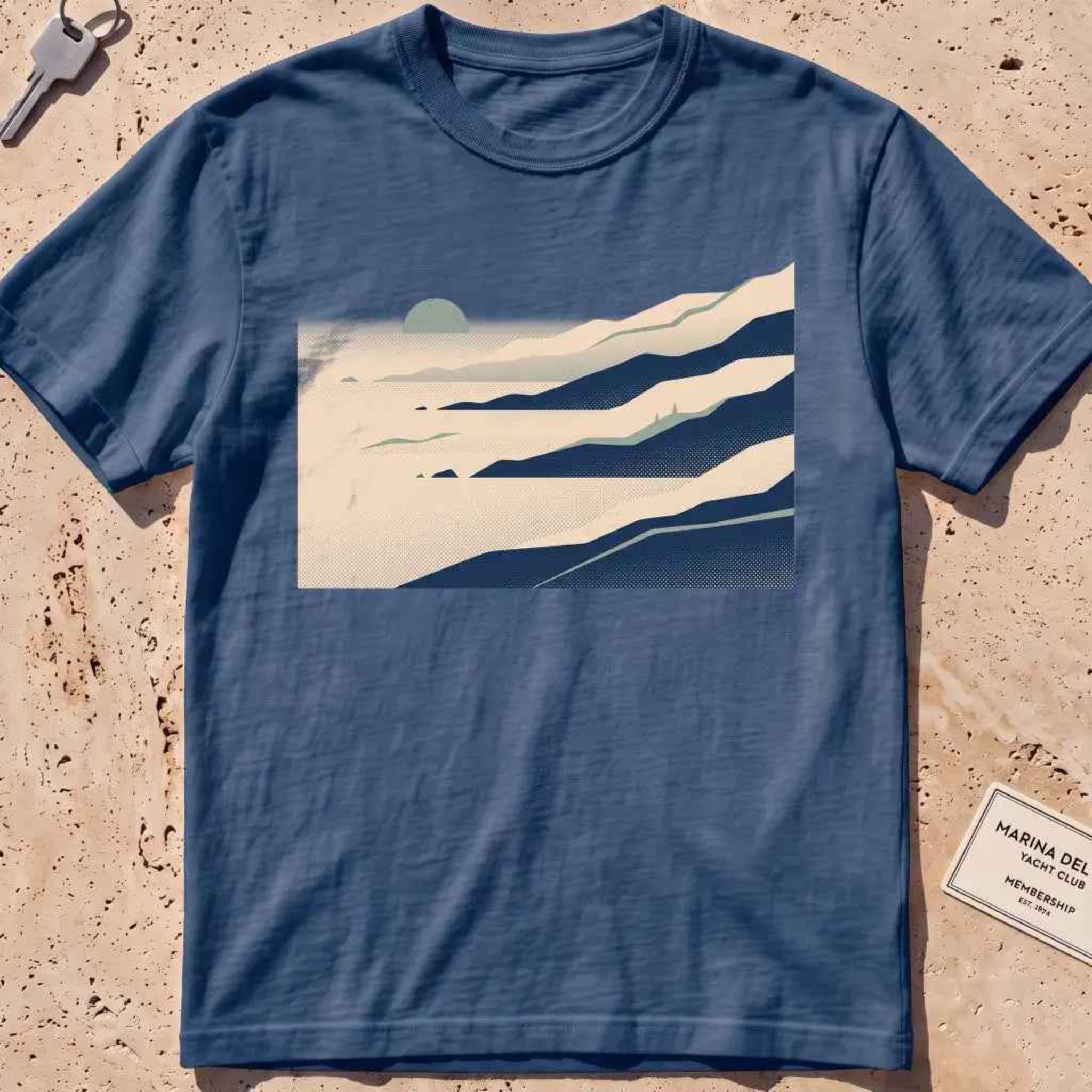 midnight heavyweight tee with layered wordless sea-fog ridges graphic.