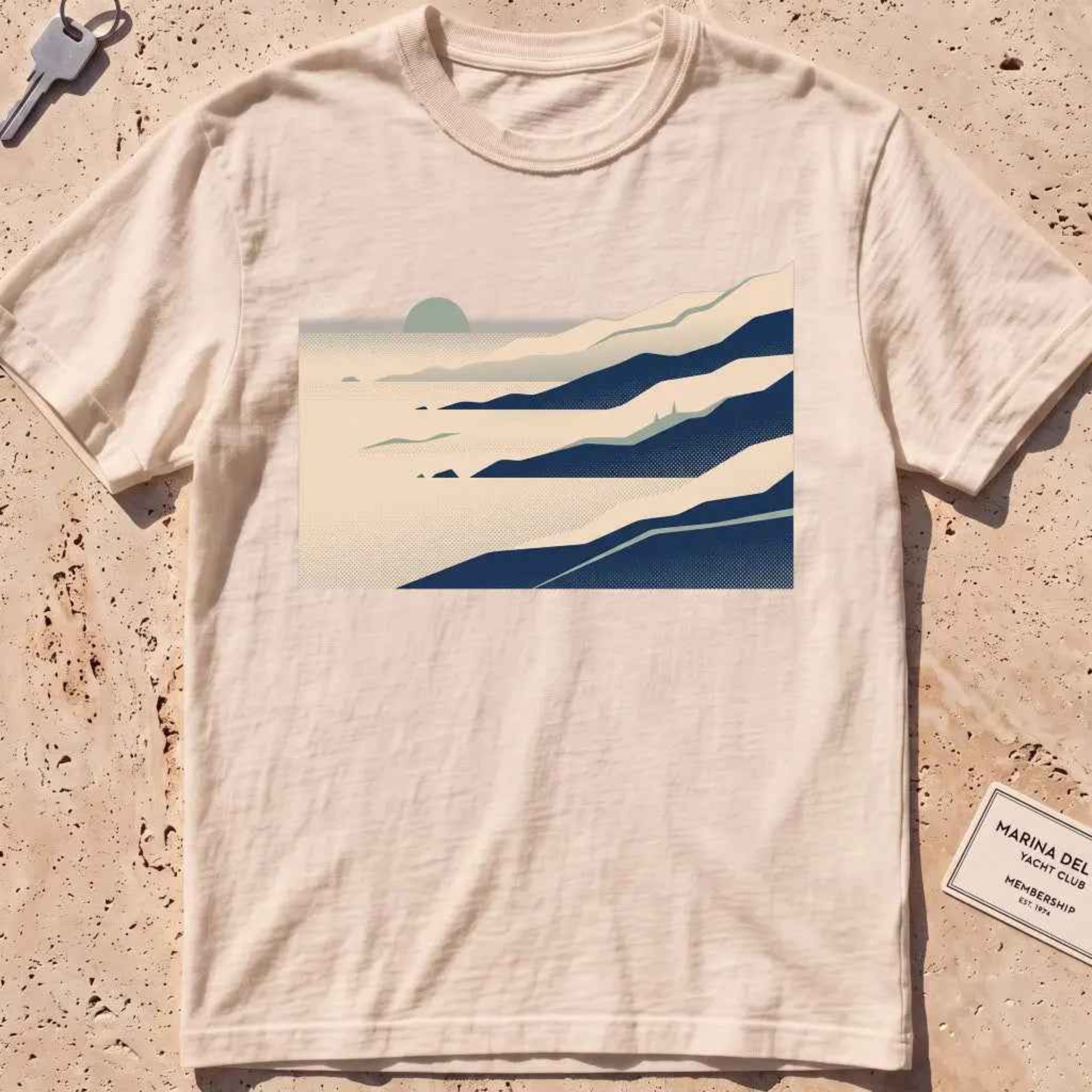 ivory heavyweight tee with layered wordless sea-fog ridges graphic.