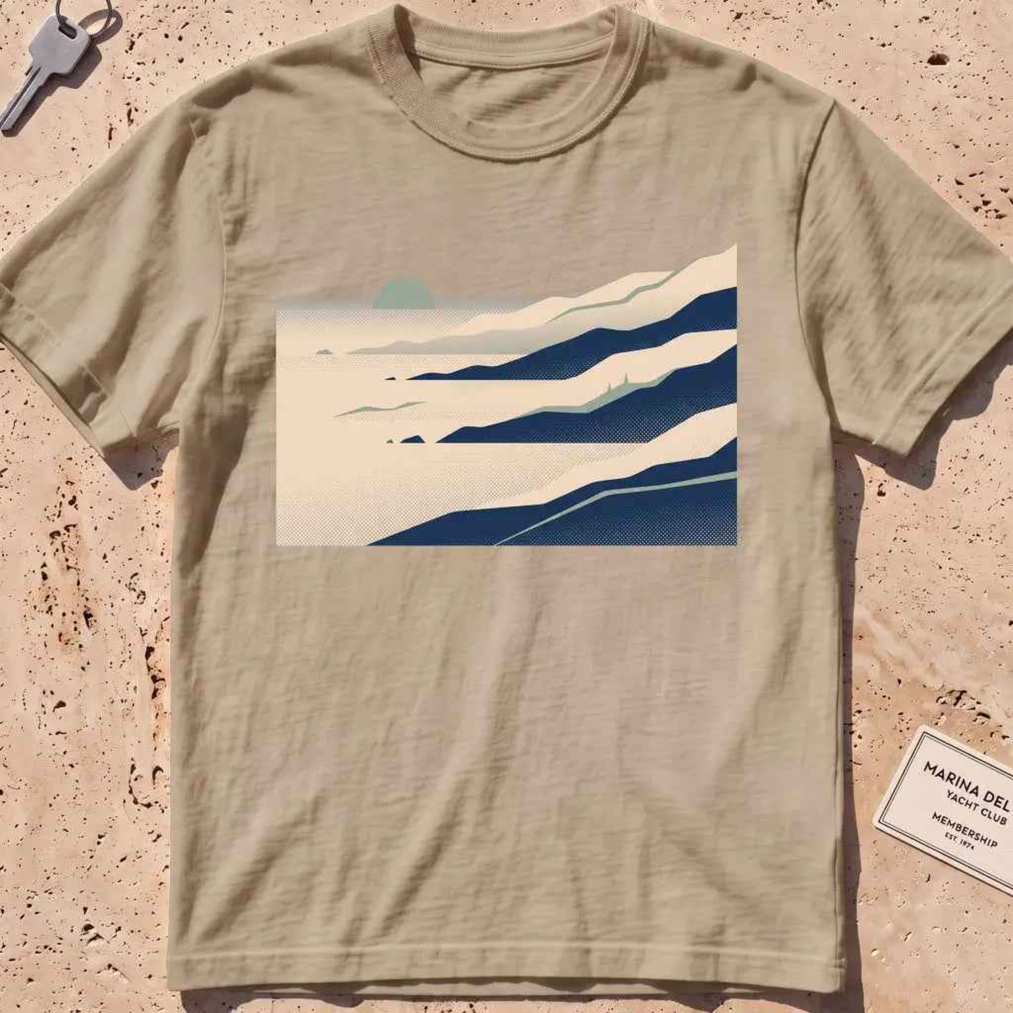 khaki heavyweight tee with layered wordless sea-fog ridges graphic.