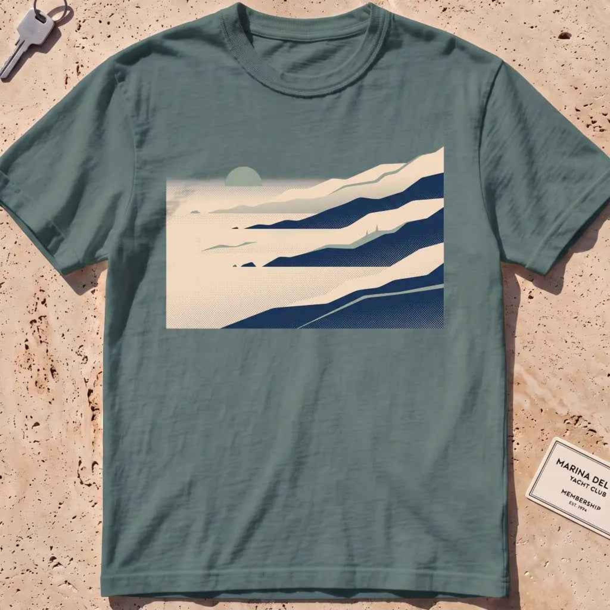 blue spruce heavyweight tee with layered wordless sea-fog ridges graphic.