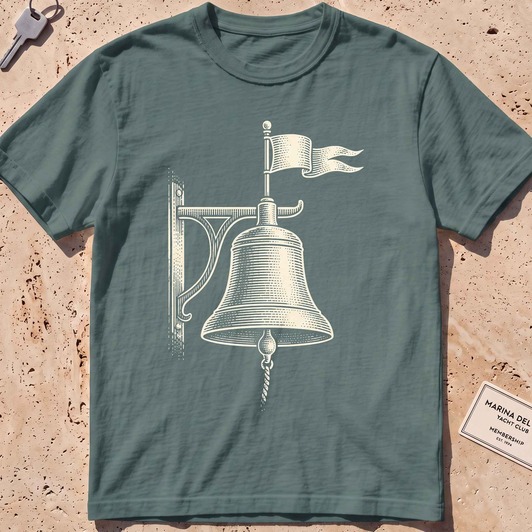 blue spruce heavyweight tee with an etched bell weathervane graphic.