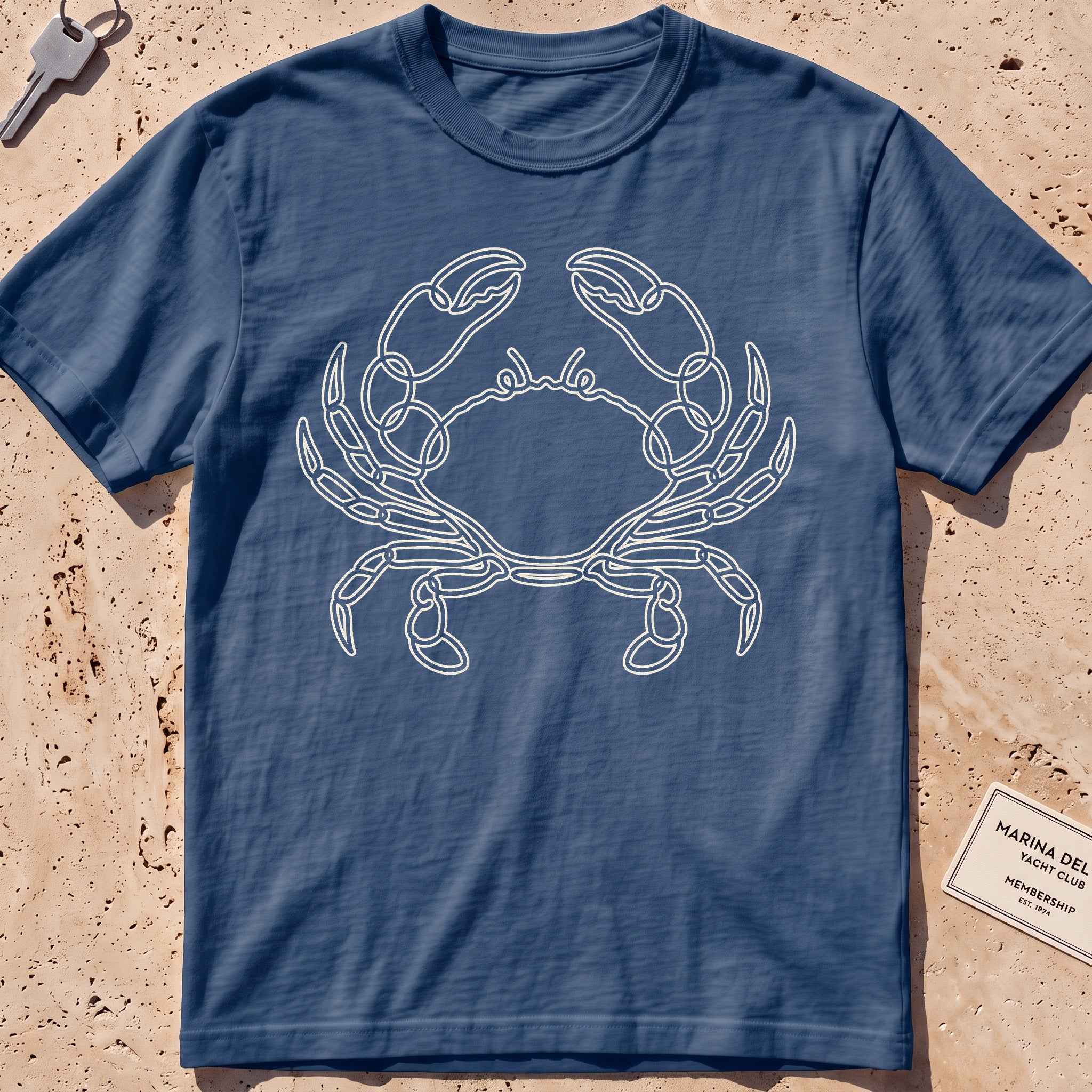 midnight heavyweight tee with a single-line sidestepping crab graphic.