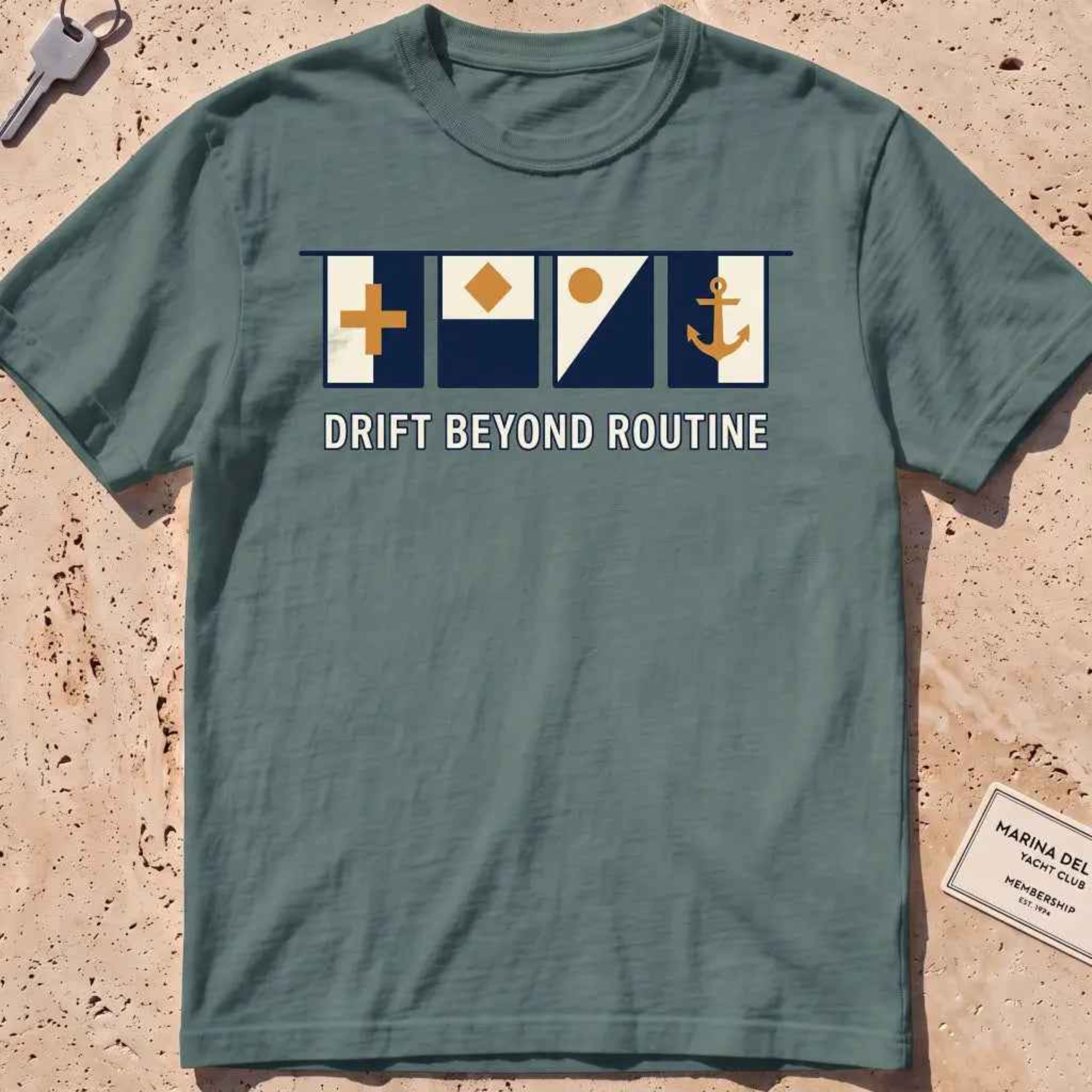 blue spruce heavyweight tee with maritime signal flags and "Drift Beyond Routine" text.