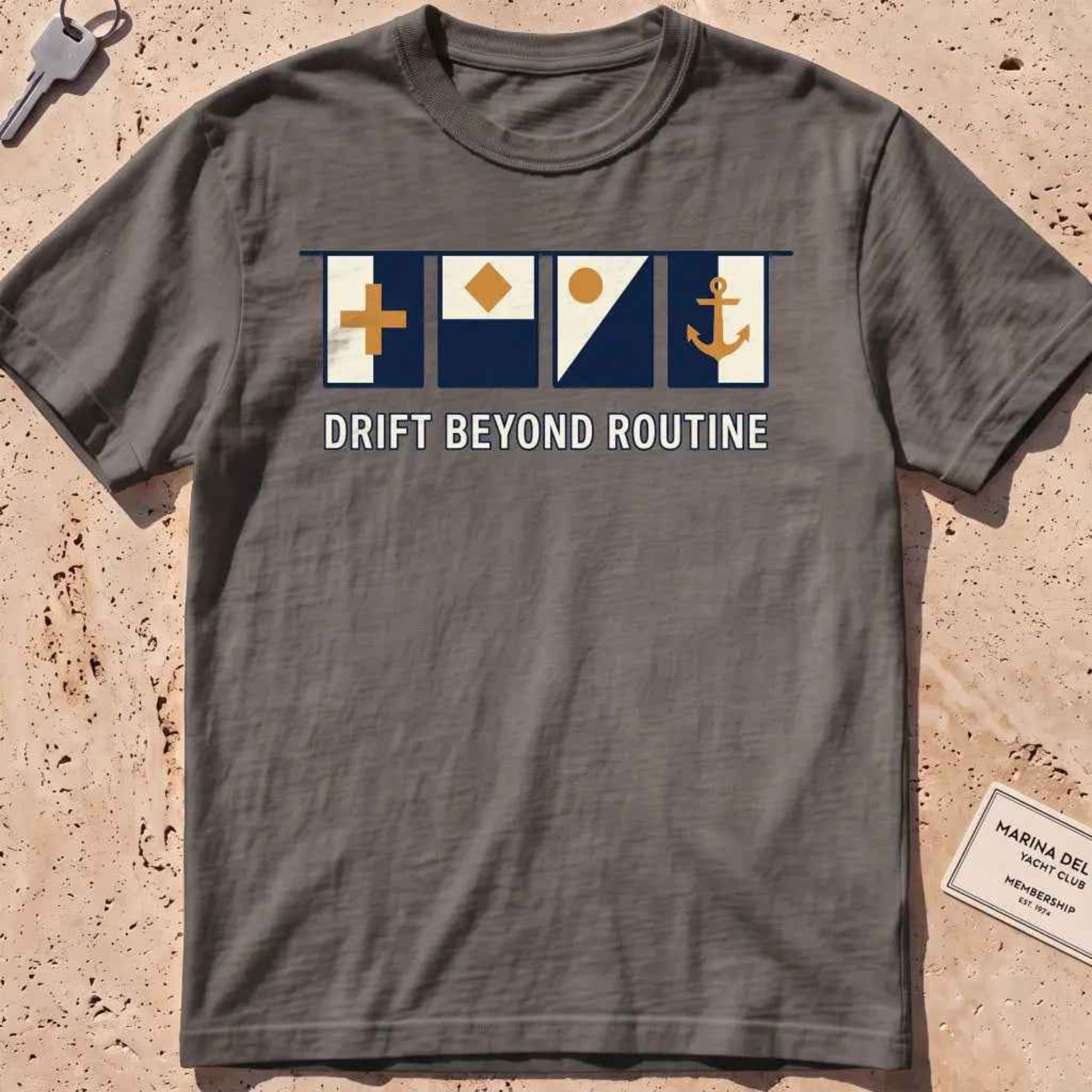 pepper heavyweight tee with maritime signal flags and "Drift Beyond Routine" text.