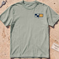 bay heavyweight tee with a pair of maritime signal flags crest graphic.