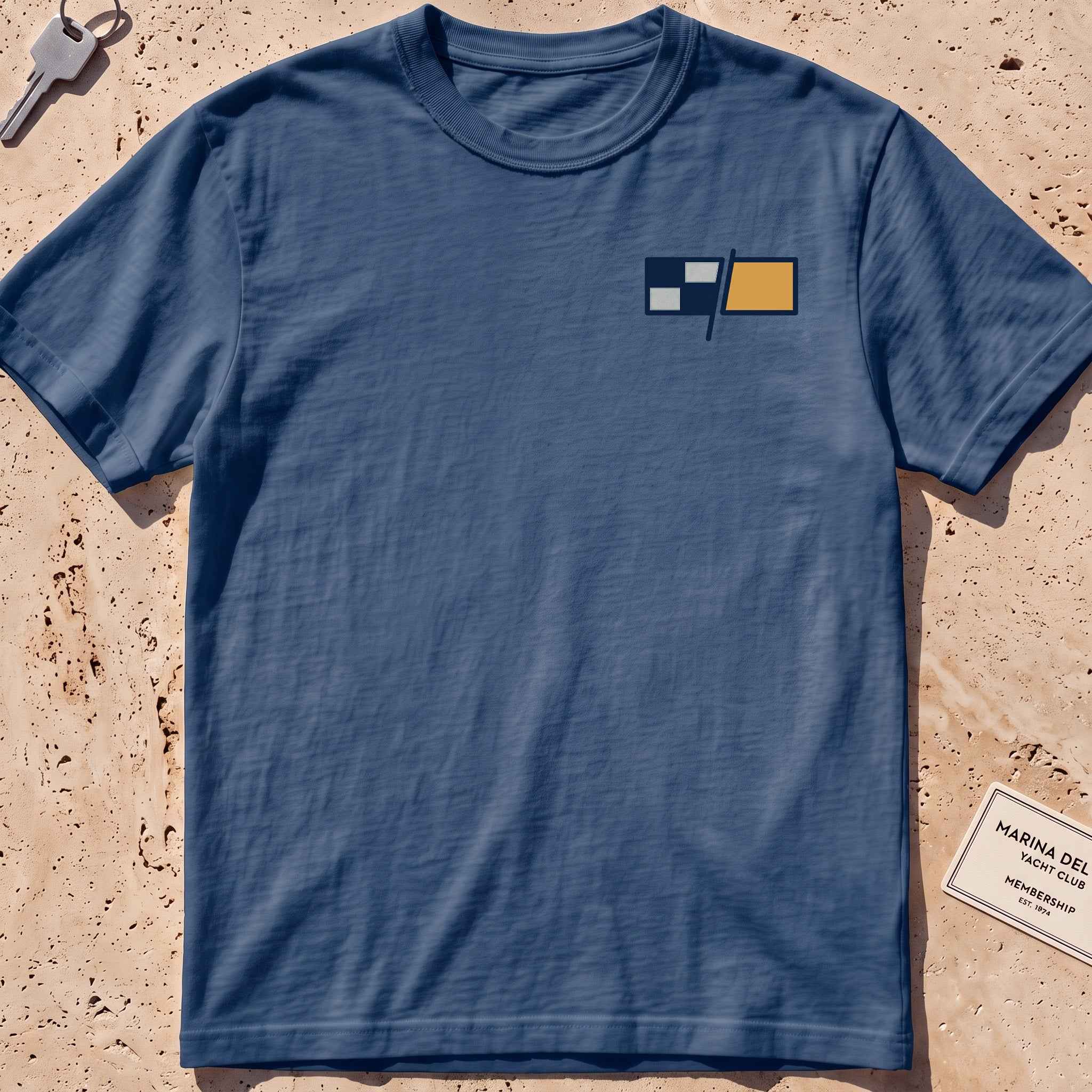 midnight heavyweight tee with a pair of maritime signal flags crest graphic.