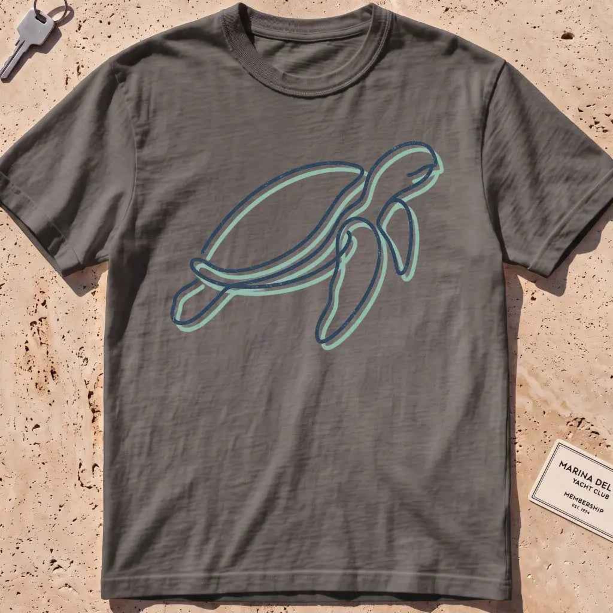 pepper heavyweight tee with a single continuous-line sea turtle graphic.
