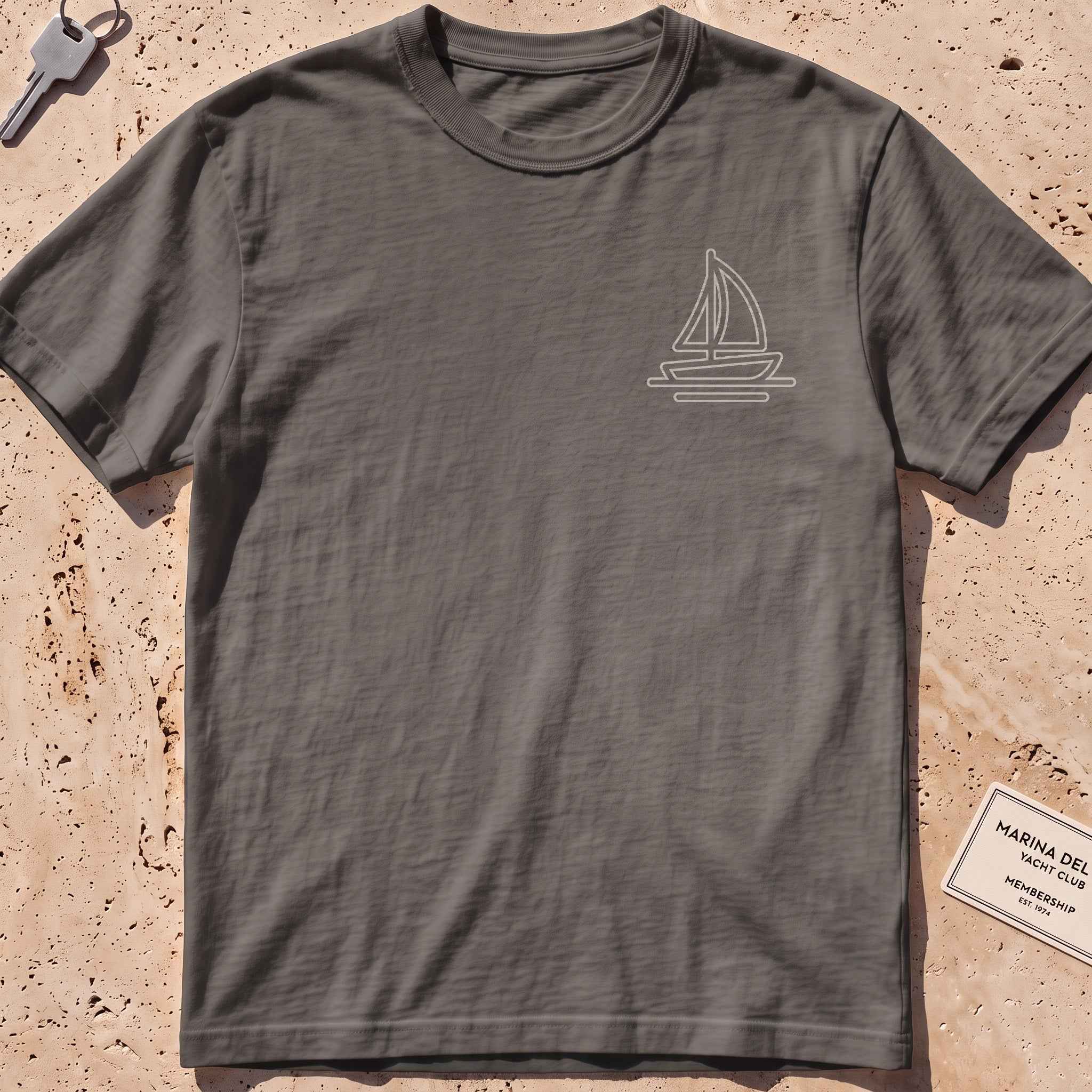 pepper heavyweight tee with a single-line lone sail crest graphic.