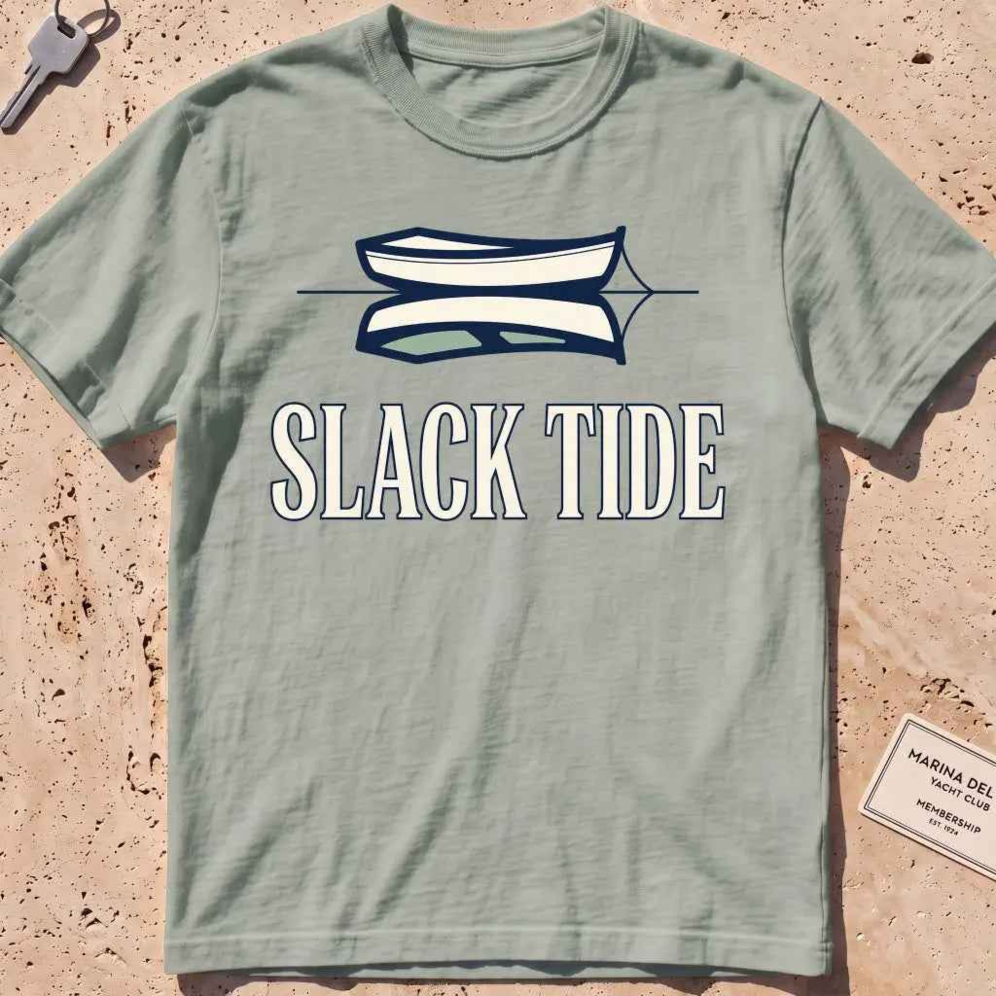 bay heavyweight tee with a moored dinghy and still-water reflection graphic.