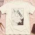 Front view of the natural Chart Table T-Shirt with a chart showing contour lines, dividers, parallel rulers and a red course line.