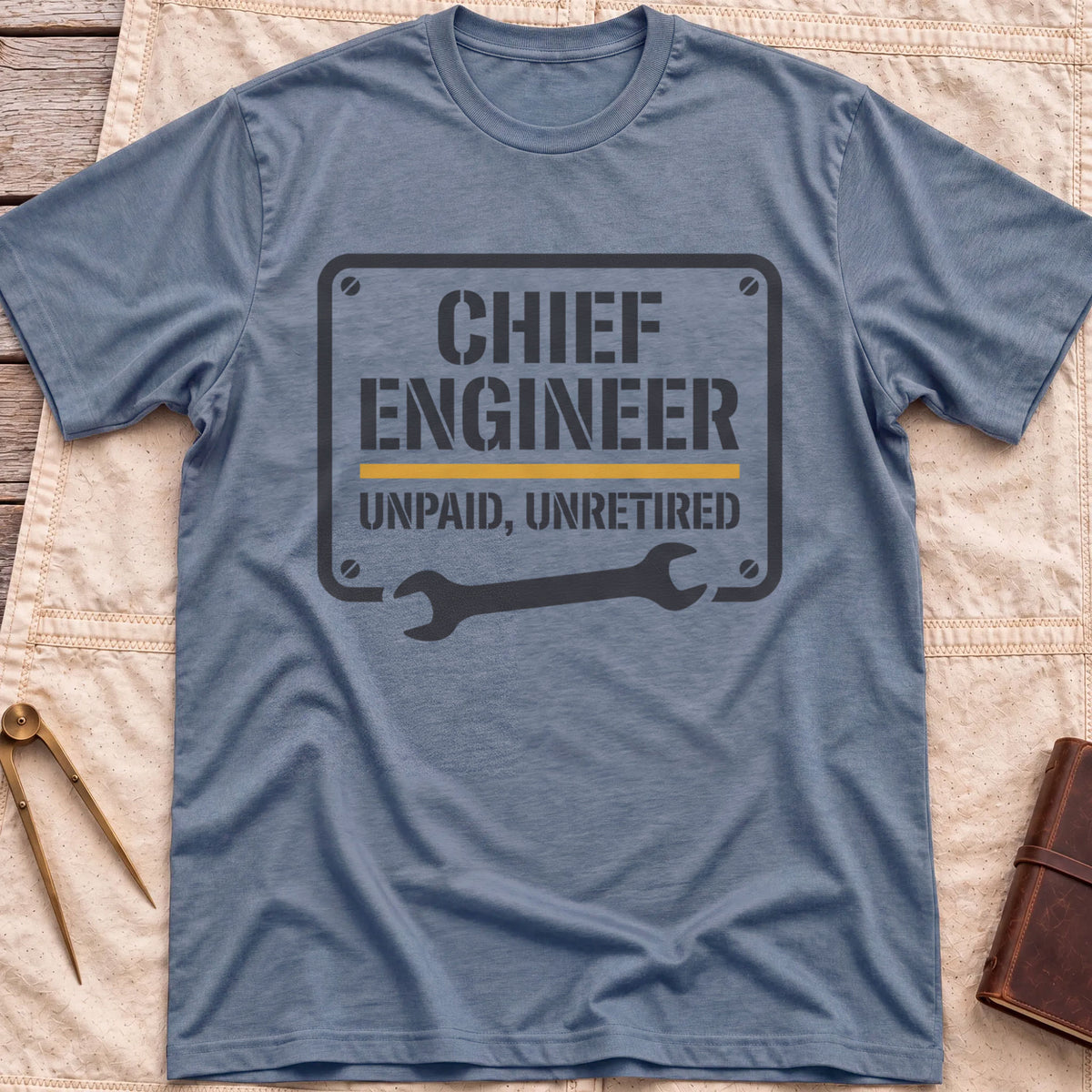 Front view of the heather indigo Chief Engineer T-Shirt with a stencil-style plate reading Unpaid, Unretired above a wrench.