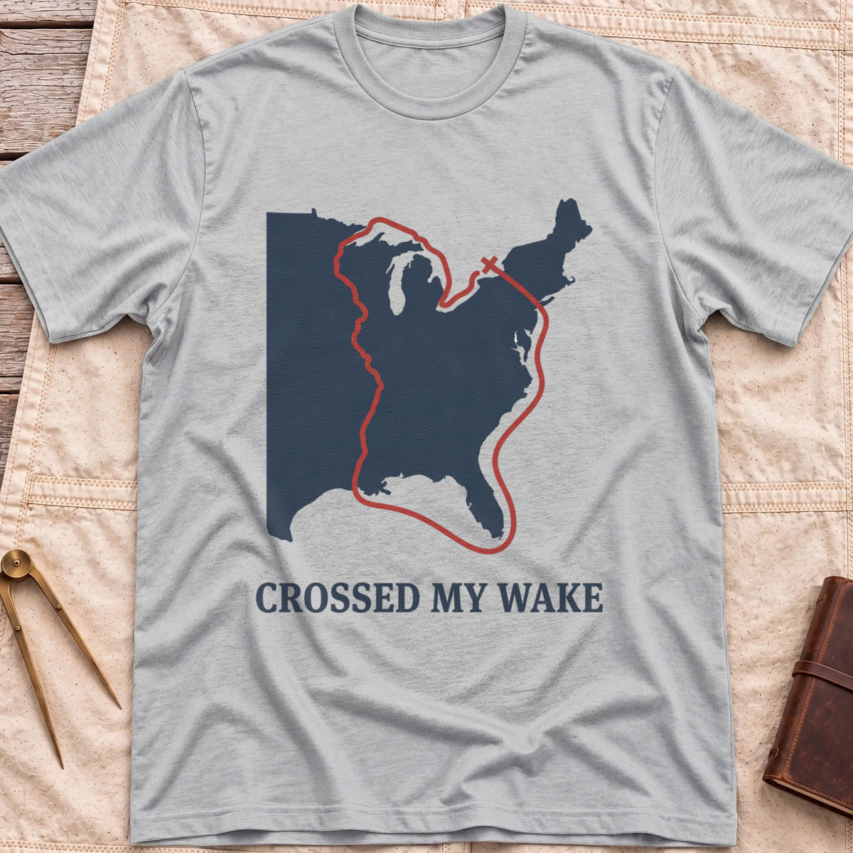 Front view of the sport grey Crossed My Wake T-Shirt with a red route line looping around a map of the eastern United States.