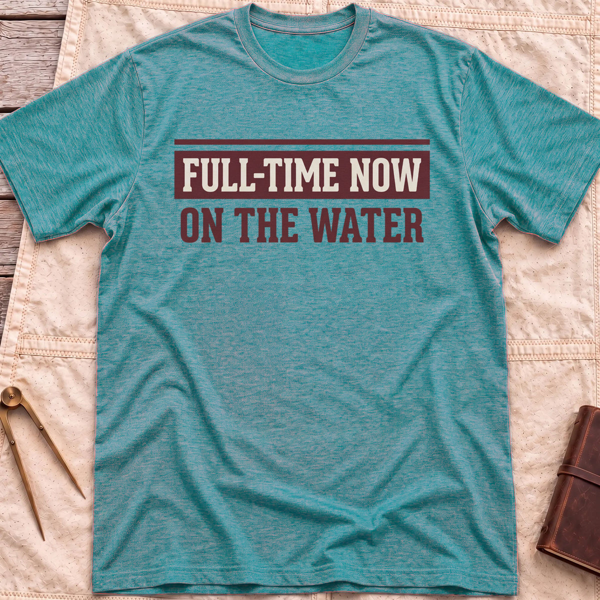 Front view of the heather galapagos blue Full Time Now T-Shirt with the words Full-Time Now, On the Water in bold block lettering.
