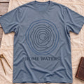 Front view of the heather indigo Home Waters T-Shirt with a set of wavy contour lines marked 12, 30 and 60.