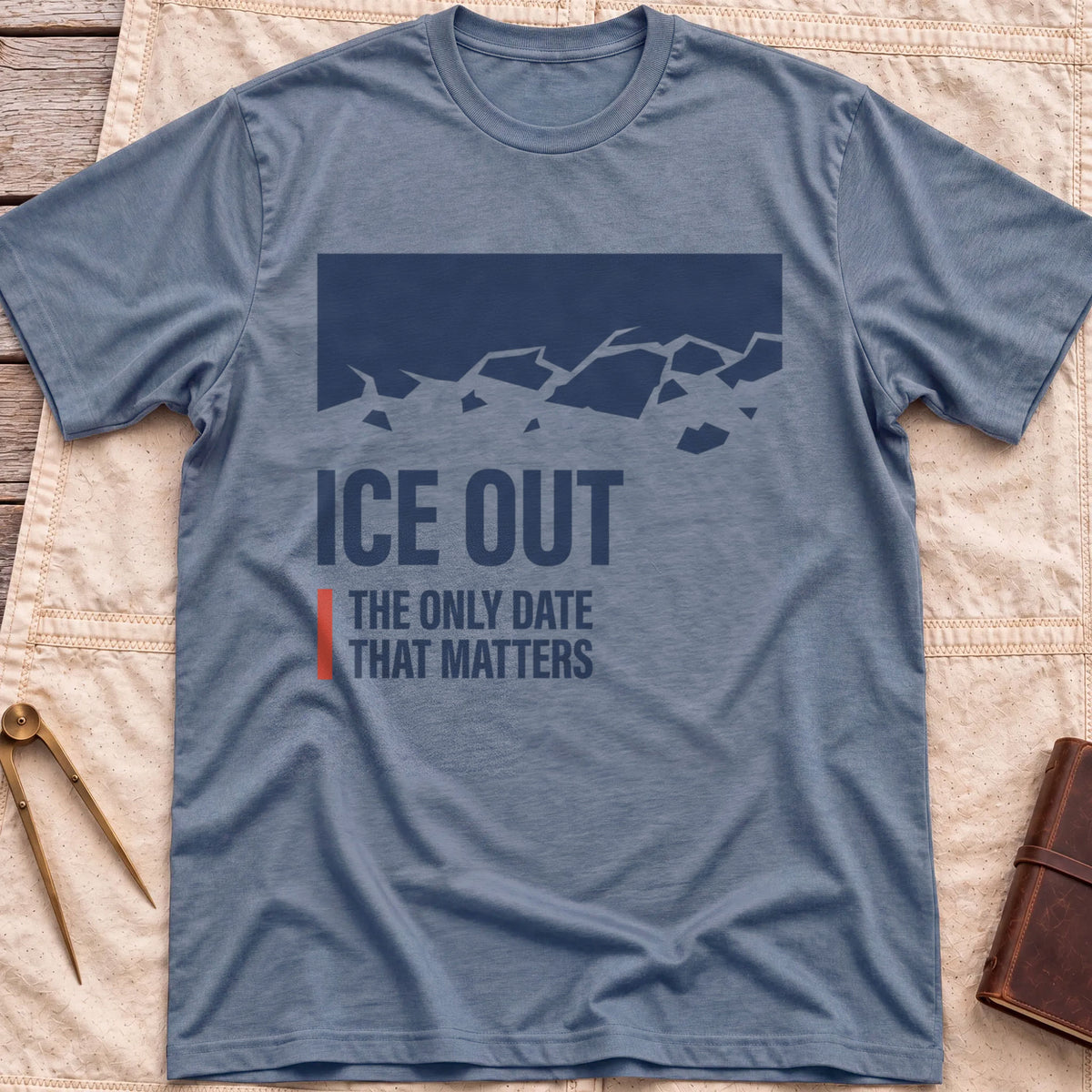 Front view of the heather indigo Ice Out T-Shirt with a navy block breaking into ice fragments above the words The Only Date That Matters.