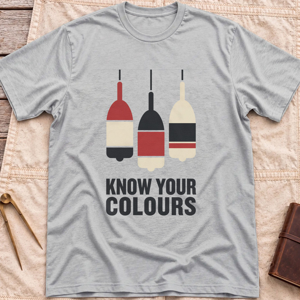 Front view of the sport grey Know Your Colours T-Shirt with three hanging buoys painted in red, black and cream bands above the words Know Your Colours.