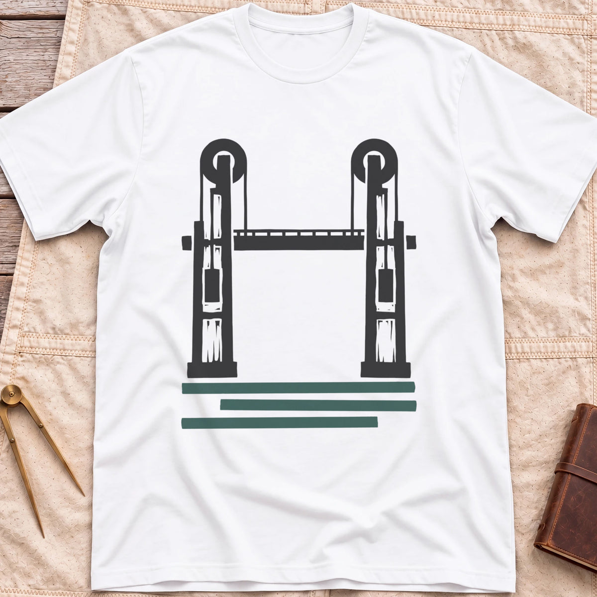 Front view of the white Lift Bridge T-Shirt with a silhouette of a lift bridge, its two towers topped with wheels.