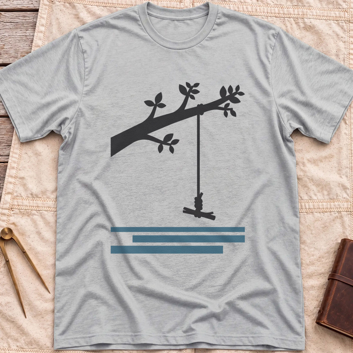 Front view of the sport grey Rope Swing T-Shirt with a rope swing hanging from a leafy branch above water lines.