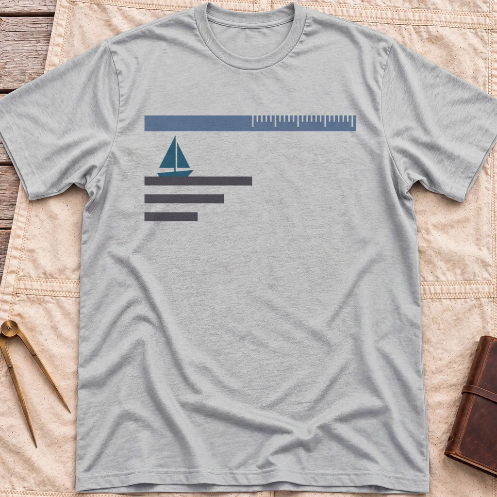 Front view of the sport grey Sea Room T-Shirt with a small sailboat beneath a long scale bar, above three stacked lines.