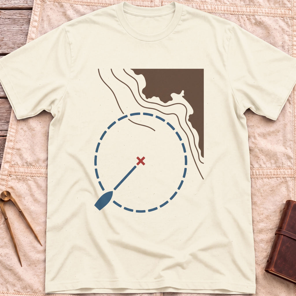 Front view of the natural Swing Circle T-Shirt with a boat on a line inside a dashed circle around a red cross, beside a stretch of coastline.