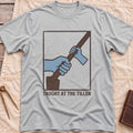 Front view of the sport grey Taught at the Tiller T-Shirt with a framed illustration of a larger hand and a smaller hand gripping a tiller together.
