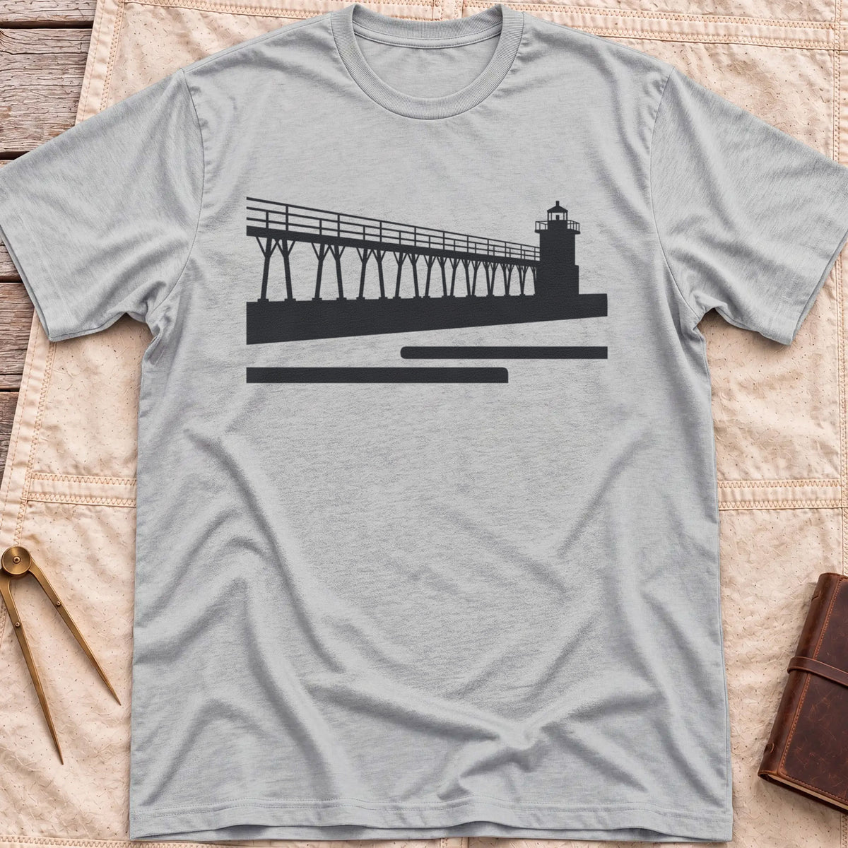 Front view of the sport grey The Catwalk T-Shirt with a silhouette of a raised walkway running along a pier to a lighthouse.