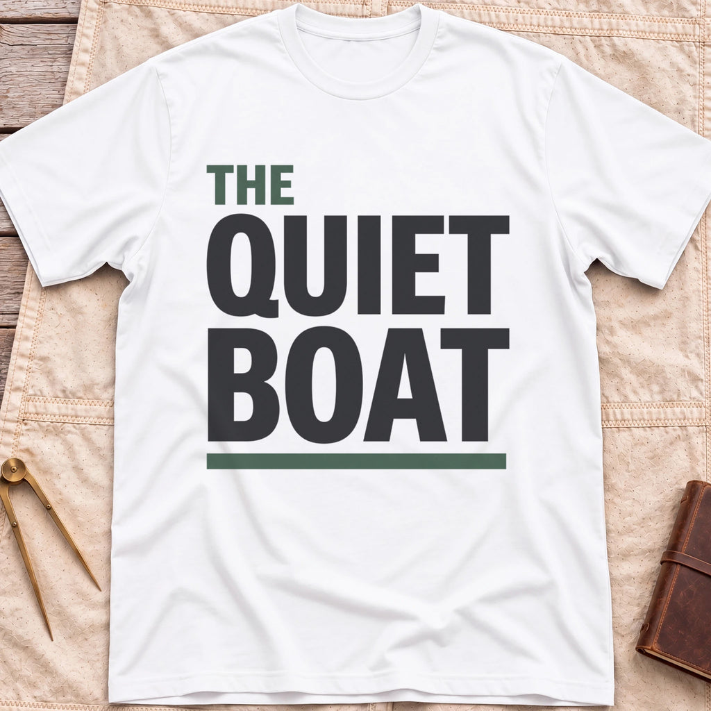 Front view of the white The Quiet Boat T-Shirt with the words The Quiet Boat in heavy capitals above a green underline.