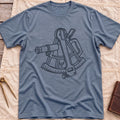 Front view of the heather indigo The Sextant T-Shirt with a line drawing of a sextant.