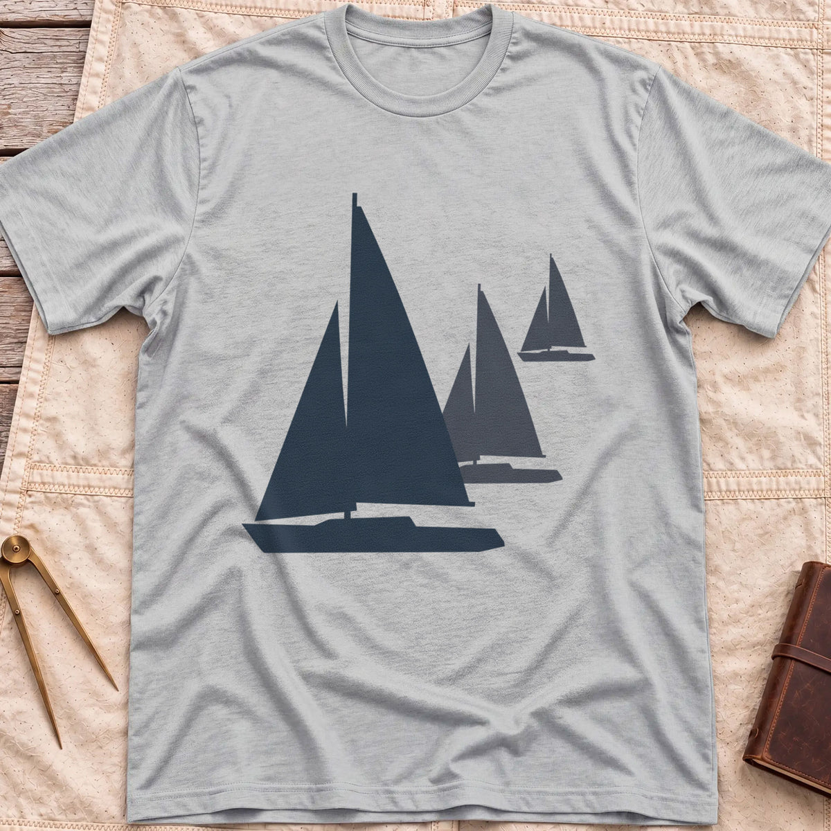 Front view of the sport grey Three Sails T-Shirt with silhouettes of three sailboats in decreasing sizes.