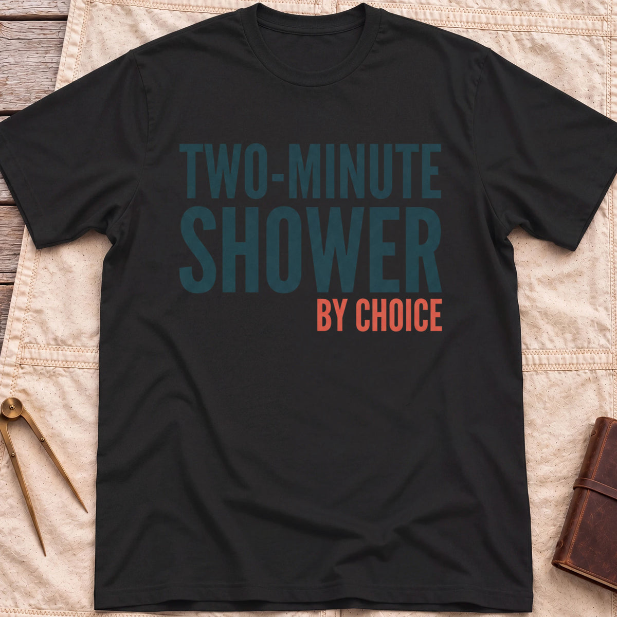 Front view of the black Two Minute Shower T-Shirt with the words Two-Minute Shower, By Choice in bold lettering.