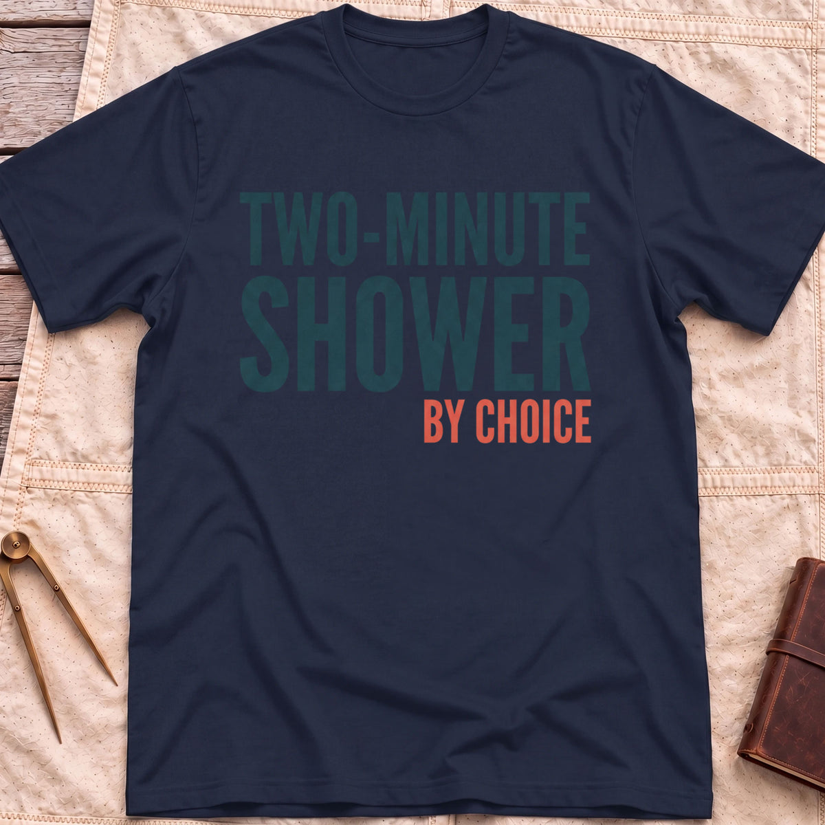 Front view of the navy Two Minute Shower T-Shirt with the words Two-Minute Shower, By Choice in bold lettering.