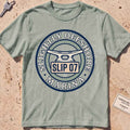 bay heavyweight tee with a dock cleat and "Slip 07" badge graphic.