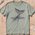 bay heavyweight tee with an etched sperm whale diving deep graphic.